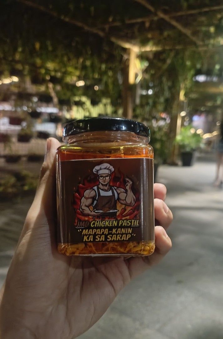 JMD Chicken Pastil - Various Flavors (Category: Packaged & Instant Food) located in Angeles City. Submitted by kmangalindan_ (Listing ID 1417179684, Image 1). Description: JMD Chicken Pastil, a delicious and flavorful condiment. Available flavors include Original Spicy, Beef Pastil, Honey BBQ, Salted Egg, Bicol Express, Biryani, and Adobo. Made with 100% chicken and no added preservatives. Perfect to pair with your favorite dishes. Get yours now!