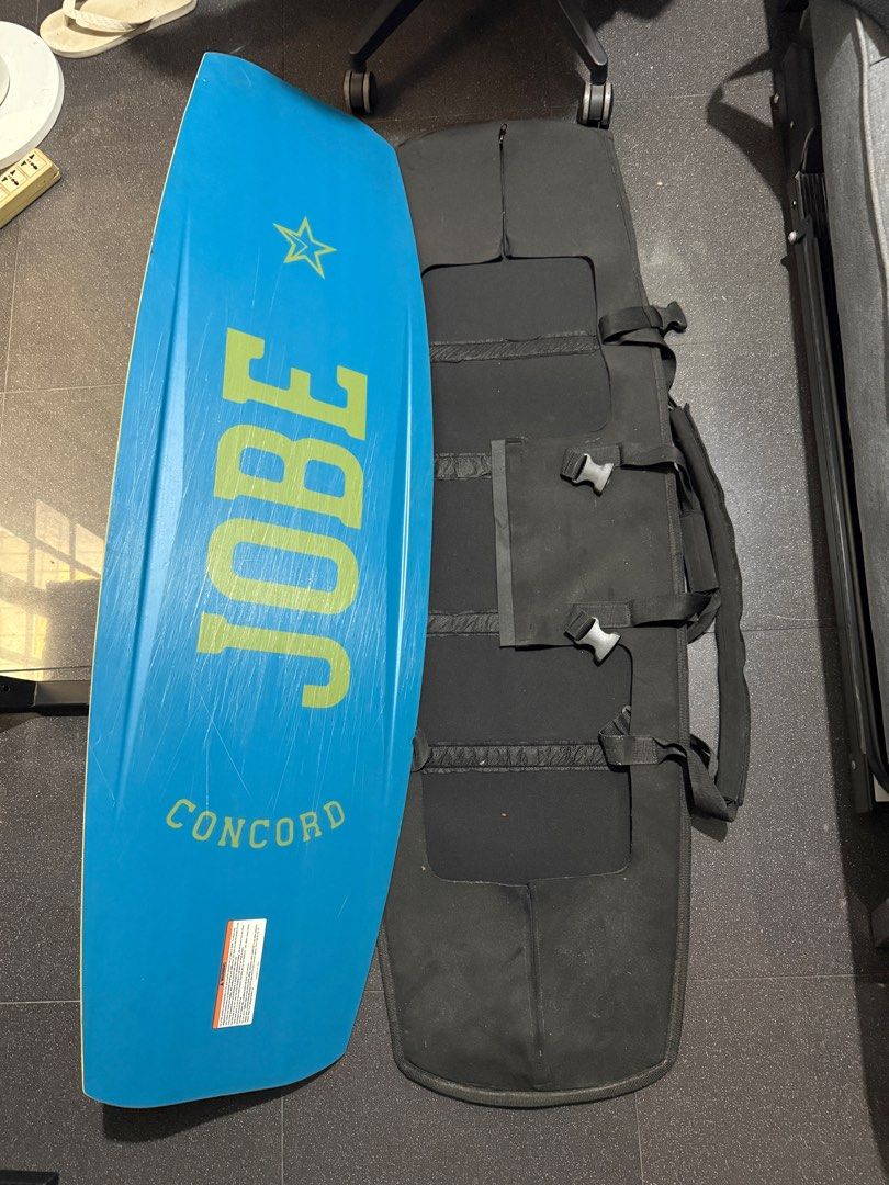 Jobe Concord Wakeboard with Bag (Category: Water Sports) located in Makati City. Submitted by technmd7 (Listing ID 1417034071, Image 2). Description: - Jobe Concord wakeboard - Size 137cm - Includes bindings (need toe strap replacement) and carrying bag - Board design: Blue, white, and yellow - Bindings: Black with blue accents - Bag: Black with multiple compartments and straps - No boots.