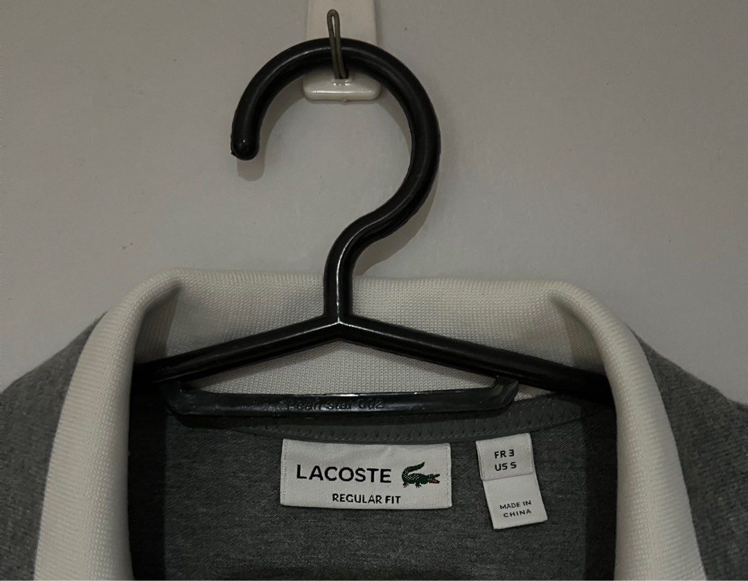 Lacoste Polo Shirt (Category: Shirts) located in Paranaque City. Submitted by cheesecakeflow (Listing ID 1417036010, Image 3). Description: Lacoste Gray Polo Shirt (For men, cause I prefer loose fitting tops) Sf shouldered by buyer .