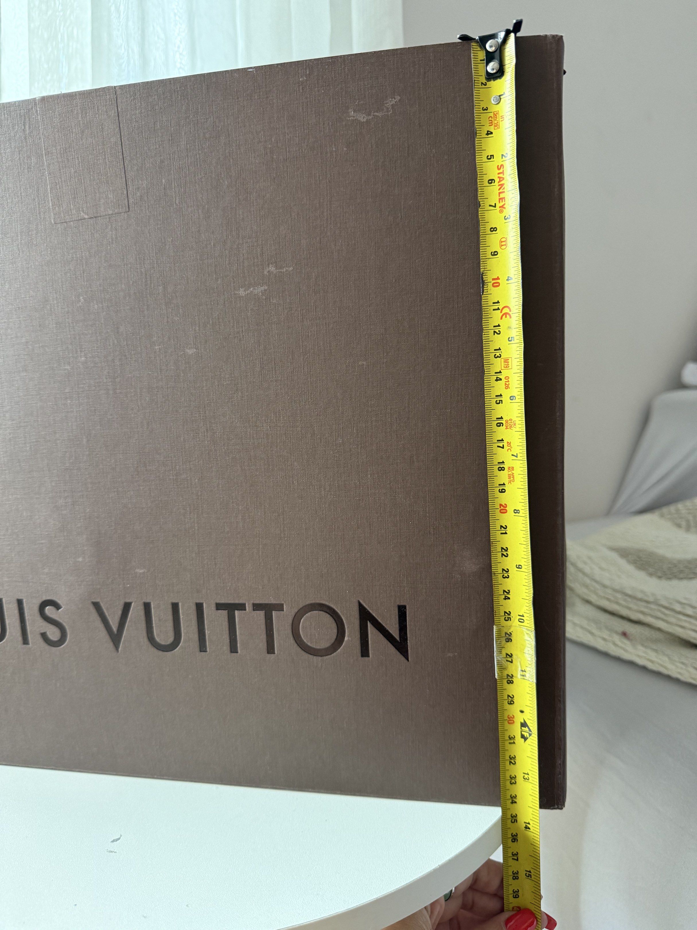 Louis Vuitton Box and Paper Bag (Category: Luxury Bags & Wallets) located in Makati City. Submitted by vintage_beauty1 (Listing ID 1417081188, Image 3). Description: - Authentic Louis Vuitton box and paper bag. - Brown box with the Louis Vuitton logo. - Includes original Louis Vuitton paper bag. - Ideal for gifting or storage. Can fit speedy 30 or other bigger Louis Vuitton bigger size bag ~ Foldable box Price:2,500 or buyer best offer Final sale