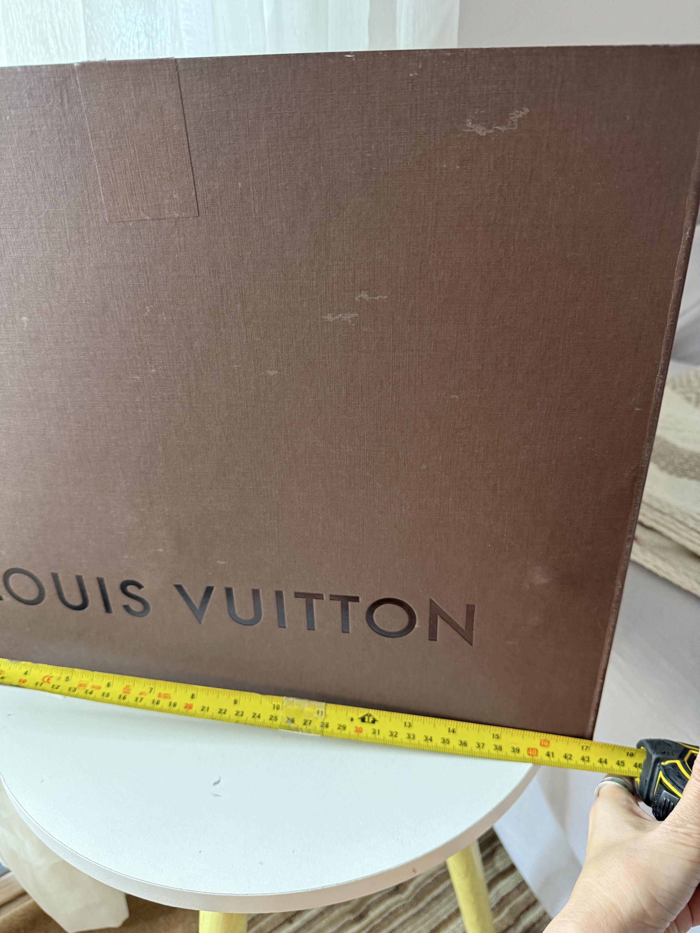Louis Vuitton Box and Paper Bag (Category: Luxury Bags & Wallets) located in Makati City. Submitted by vintage_beauty1 (Listing ID 1417081188, Image 2). Description: - Authentic Louis Vuitton box and paper bag. - Brown box with the Louis Vuitton logo. - Includes original Louis Vuitton paper bag. - Ideal for gifting or storage. Can fit speedy 30 or other bigger Louis Vuitton bigger size bag ~ Foldable box Price:2,500 or buyer best offer Final sale