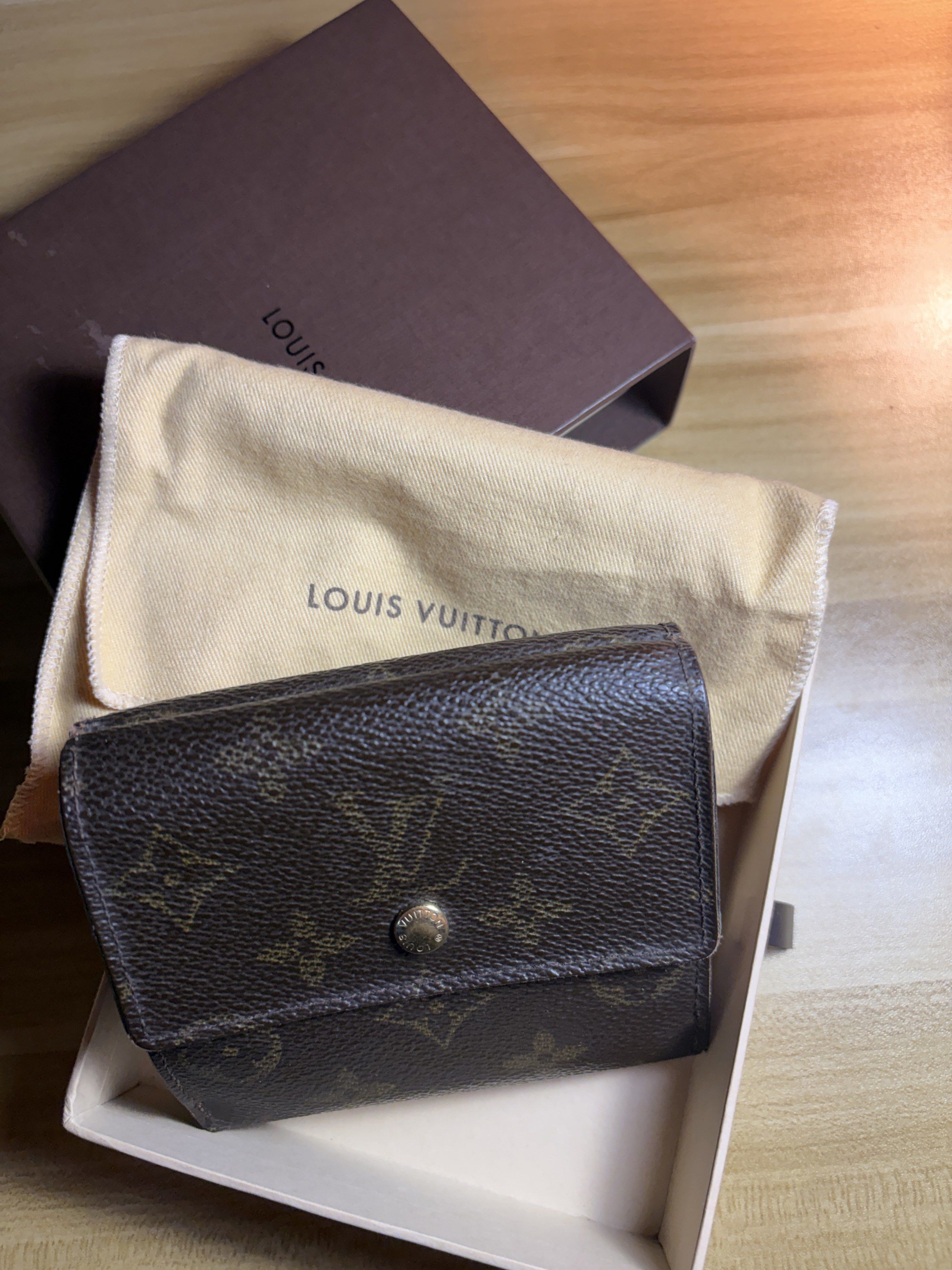 Louis Vuitton Monogram Portefeuille Elise Wallet (Category: Luxury Bags & Wallets) located in Vigan. Submitted by longliveolive (Listing ID 1417203840, Image 2). Description: - Authentic Louis Vuitton Monogram wallet - Snap closure - Multiple interior compartments - Includes original box and dust bag - Made in France - Iconic monogram pattern visible.