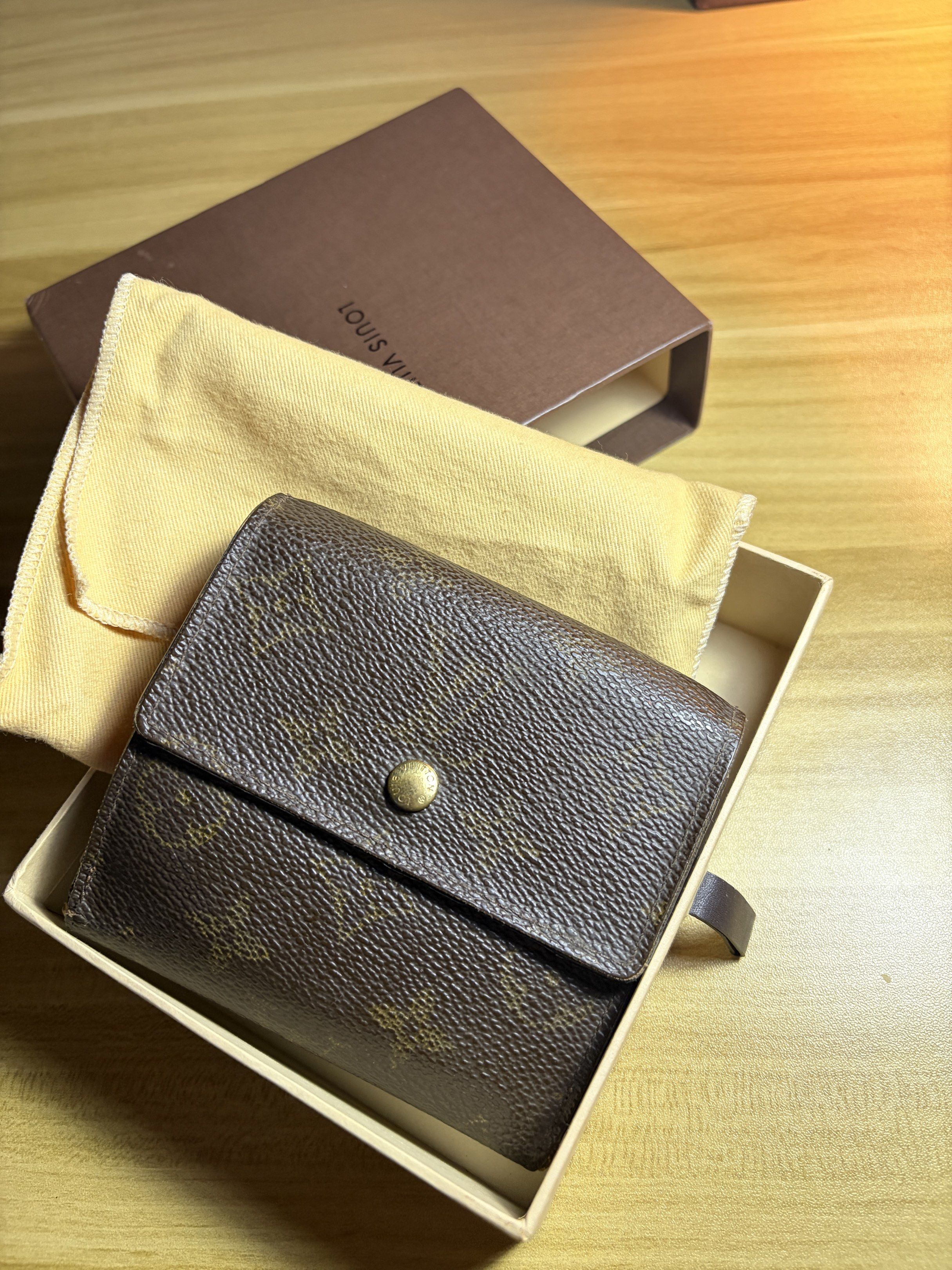 Louis Vuitton Monogram Portefeuille Elise Wallet (Category: Luxury Bags & Wallets) located in Vigan. Submitted by longliveolive (Listing ID 1417203840, Image 1). Description: - Authentic Louis Vuitton Monogram wallet - Snap closure - Multiple interior compartments - Includes original box and dust bag - Made in France - Iconic monogram pattern visible.
