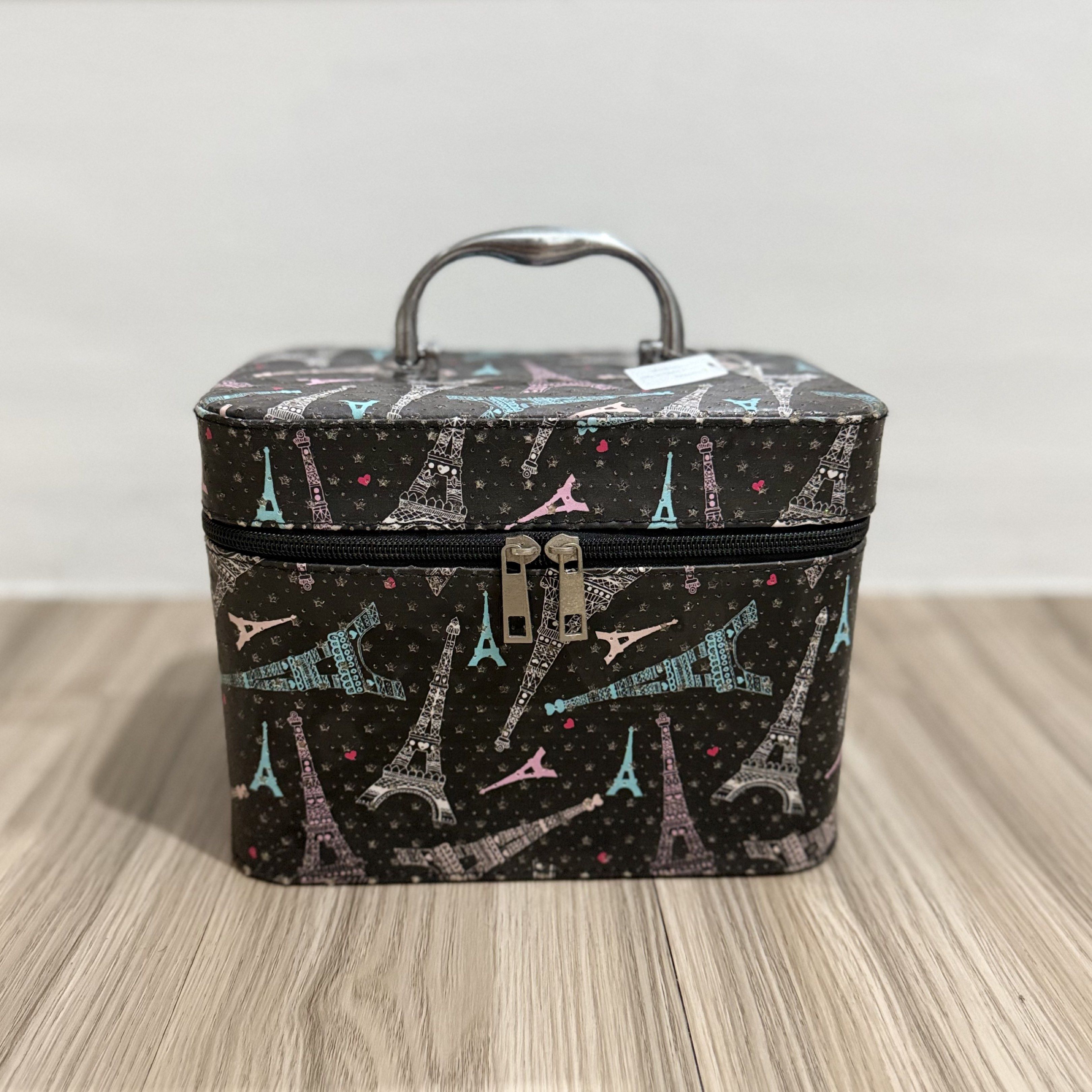 MakeUp Kit / Box / Bag/ Storage with Mirror (Category: Accessory Holder, Box & Organizers) located in Manila. Submitted by declutternclutter (Listing ID 1417064990, Image 1). Description: Makeup kit/box/bag/storage with mirror - Black, Pink on the inside, Eiffel Tower design - Zipper - With Mirror on the inside - Box is stiff, so it’s non-foldable Dims: Height: 17 cm / 6.7 in Length: 23 cm / 7.9 in Width: 15 cm / 6 in.