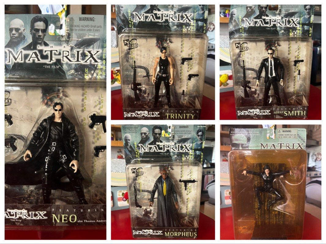 Matrix Action Figures - Neo, Trinity, Morpheus, Agent Smith (Category: Action & Battle Toys) located in Las Pinas. Submitted by rjmwings (Listing ID 1417076121, Image 1). Description: Collectible action figures from the 1999 Matrix film. Includes figures of Neo (aka Thomas Anderson), Trinity, Morpheus, and Agent Smith. Each figure comes with accessories like guns and weapons. The figures are in their original packaging. Mint condition. All bought