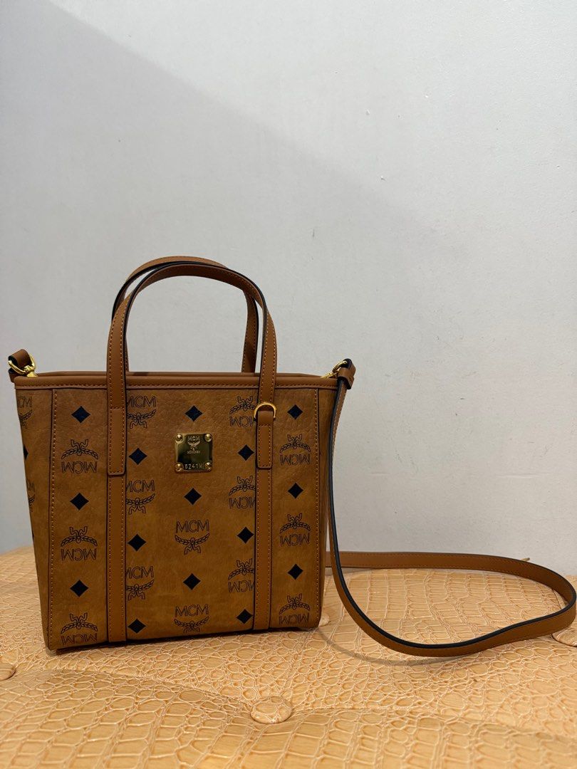 MCM Mini Toni (Category: Luxury Bags & Wallets) located in Caloocan City. Submitted by enic99 (Listing ID 1417199406, Image 1). Description: - coded with etiketa; with turnable scews and ykk zip - NGA sourced from korea - with dust bag and care card .