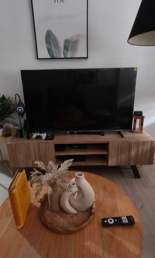TV console (Category: TV Consoles) located in Singapore. Submitted by deeyun88 (Listing ID 1417194021, Image 2). Description: Selling a modern wooden TV console in very good condition. Minimalist and stylish design, suitable for living room or bedroom. Bought the TV console from Castlery. .