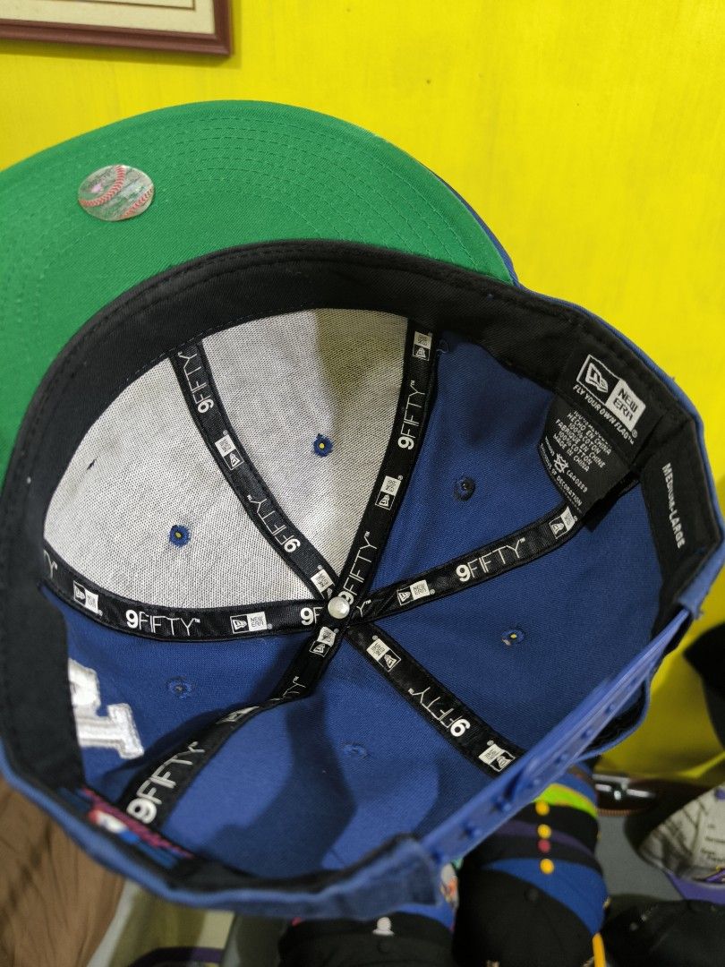 New Era Los Angeles Dodgers 9Fifty Cap (Category: Caps & Hats) located in Taguig. Submitted by 19ling68 (Listing ID 1417108755, Image 2). Description: - Official Los Angeles Dodgers 9Fifty cap - By New Era - Features team name in bold white lettering - Blue cap - Flat brim - Snapback closure - Interior with New Era branding.