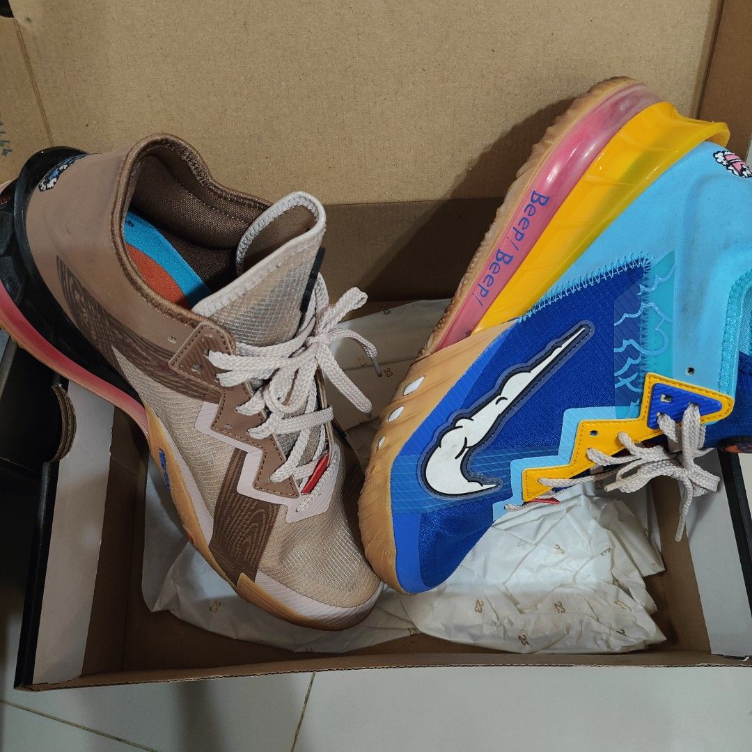 Nike LeBron 18 Low Space Jam - Coyote x Wile E (Category: Sneakers) located in Quezon City. Submitted by CooLStuff (Listing ID 1417147418, Image 1). Description: - Nike LeBron 18 Low 'Space Jam' sneakers - Features a blue and yellow color scheme - 'Beep Beep' text on the side - Includes original box - Size label present on the box.