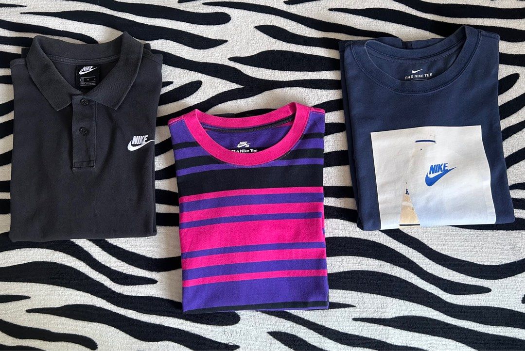 Nike Polo and Shirts for take all (Category: Tshirts & Polo Shirts ) located in Pasig City. Submitted by trina1027 (Listing ID 1417056031, Image 2). Description: FOR SALE! 2nd hand Nike Polo shirt, Nike SB Tee, and Nike Tshirt. All in size MEDIUM (Waist 21" x Length 27") Pink Nike SB Tee - 9.8/10 condition Navy Blue Nike Tshirt (makapal tela) - 9/10 con. Polo shirt - 8/10 condition 1,500 for take all. Location: Santolan, Pasig MOP: Gcash/BDO/BPI 