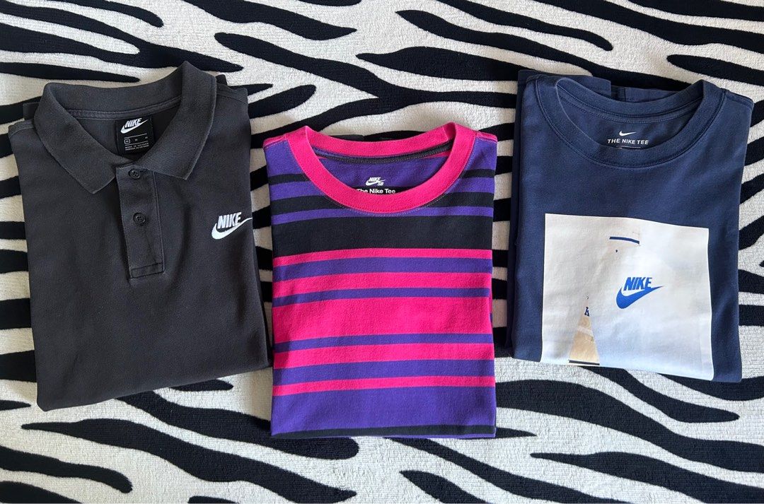 Nike Polo and Shirts for take all (Category: Tshirts & Polo Shirts ) located in Pasig City. Submitted by trina1027 (Listing ID 1417056031, Image 1). Description: FOR SALE! 2nd hand Nike Polo shirt, Nike SB Tee, and Nike Tshirt. All in size MEDIUM (Waist 21" x Length 27") Pink Nike SB Tee - 9.8/10 condition Navy Blue Nike Tshirt (makapal tela) - 9/10 con. Polo shirt - 8/10 condition 1,500 for take all. Location: Santolan, Pasig MOP: Gcash/BDO/BPI 
