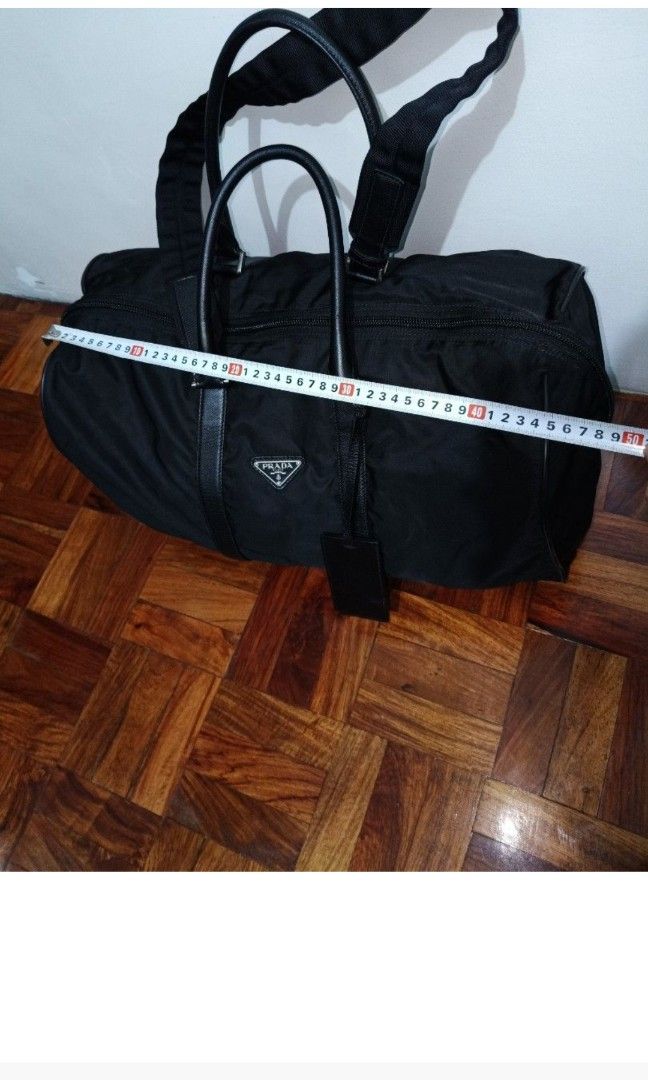 OG Prada travel bag (Category: Luxury Bags & Wallets) located in Quezon City. Submitted by miochiyajane (Listing ID 1417164106, Image 3). Description: travel Bag OG Prada, from Japan, with dustbag, messege po sa may bet🫰🫰.