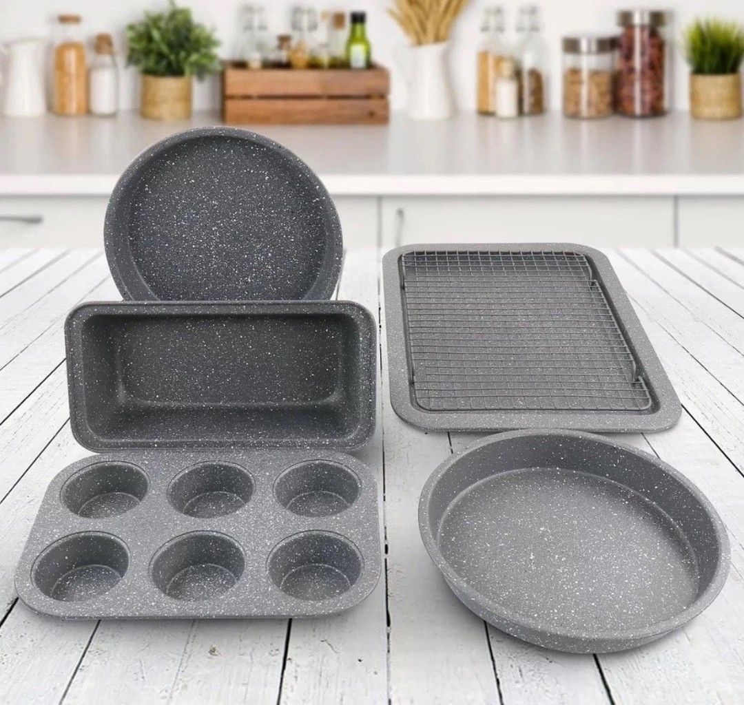 Oster Non-Stick Bakeware Set - 6 Pieces (Category: Bakeware) located in Manila. Submitted by lianlim.mail (Listing ID 1417160960, Image 2). Description: - Oster 6-piece bakeware set - Includes: loaf pan, 2 round cake pans, muffin pan, baking sheet, and cooling rack - Non-stick surface for easy baking and cleaning - Ideal for cakes, muffins, bread, and more! Bnew in box.