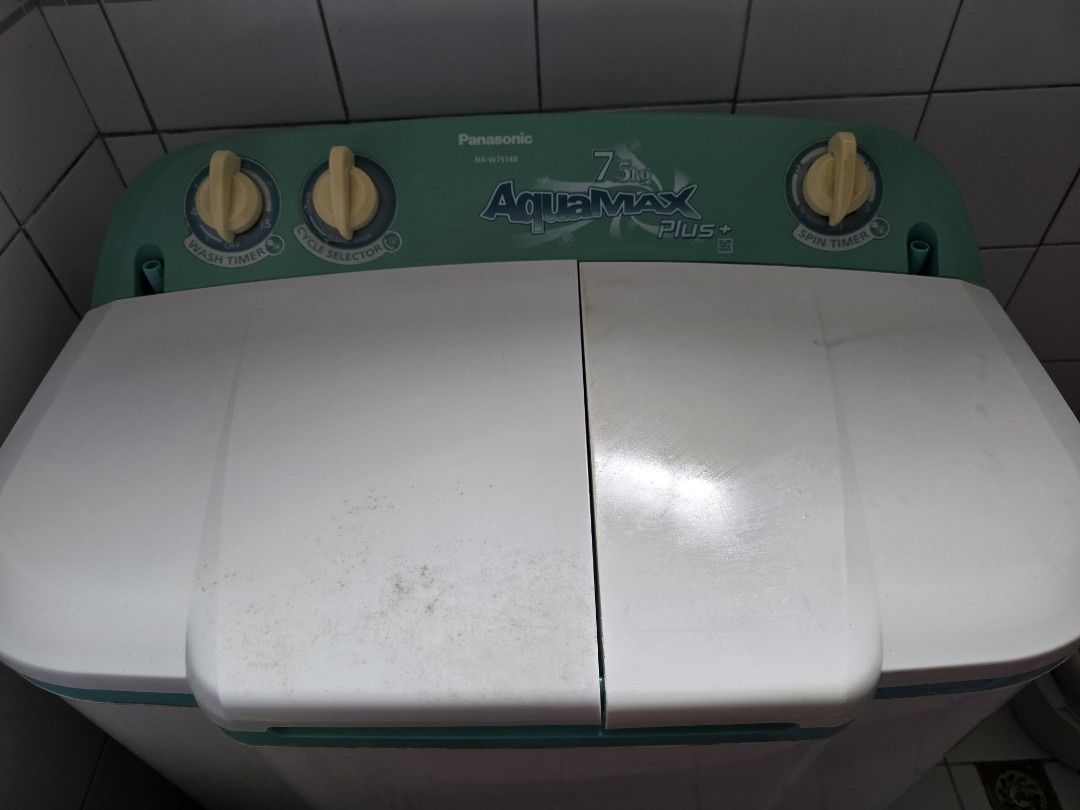 Panasonic Aquamax Plus 7.5kg Washing Machine (Category: Washing Machines and Dryers) located in Antipolo. Submitted by arya2k18 (Listing ID 1417127702, Image 1). Description: - Panasonic Aquamax Plus washing machine - 7.5kg capacity - Dual-tub design - White and teal color - Three-knob control panel - Model: NA-W7514B - Efficient for washing clothes.
