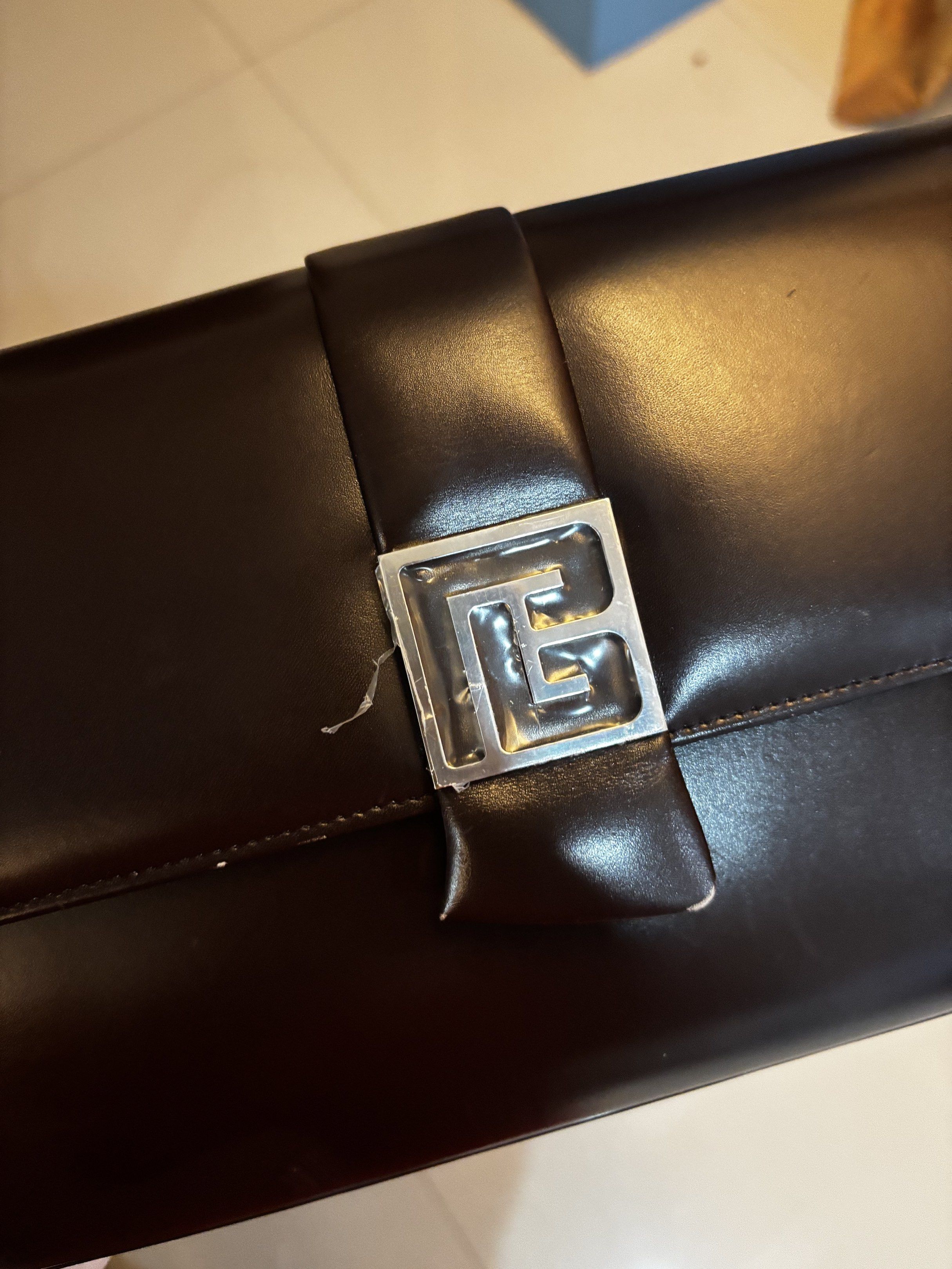 Pierre Balmain Brown Handbag (Category: Luxury Bags & Wallets) located in Davao. Submitted by jgak18 (Listing ID 1417174873, Image 2). Description: Vintage Pierre Balmain from Japan. Has slight flaws on the outside but overall still good..