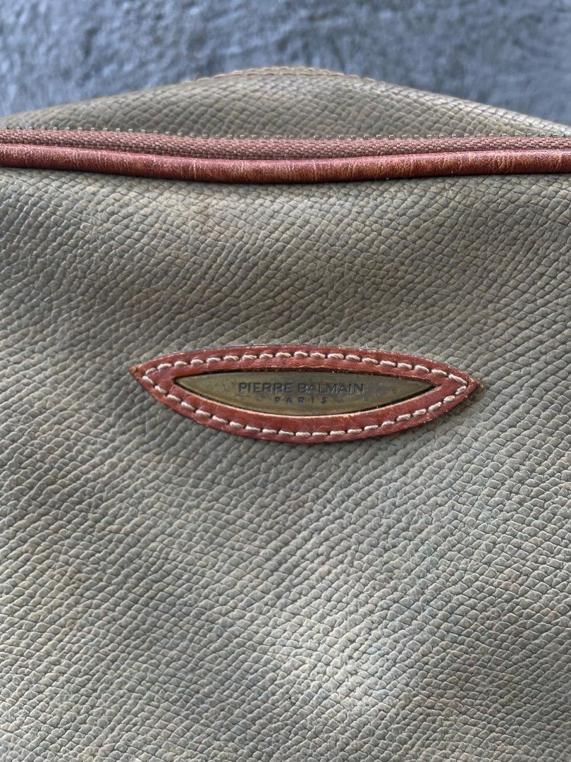 Pierre Balmain Crossbody Bag (Category: Luxury Bags & Wallets) located in Ligao. Submitted by merjudioma64633 (Listing ID 1417216163, Image 2). Description: - Authentic Pierre Balmain crossbody bag - Color: Brown and olive green - Features: - Shoulder strap - Zipper closure - Interior details: - Pierre Balmain label - Maruem Made in Japan tag - Japan Luggage Association tag - Condition: Good.