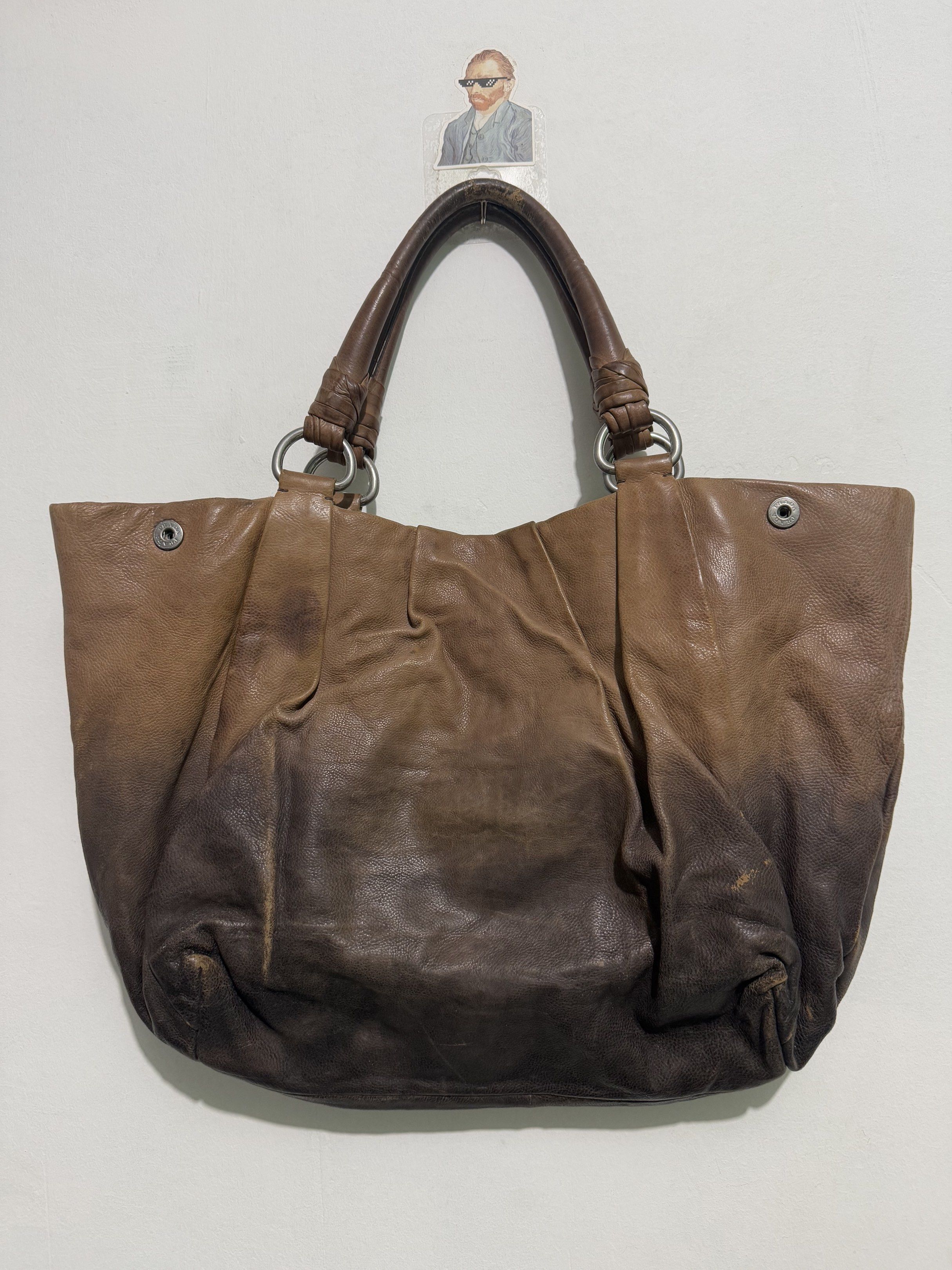 Prada Leather Tote Bag (Category: Luxury Bags & Wallets) located in Sorsogon. Submitted by jovert_23alviz (Listing ID 1417110236, Image 2). Description: Verygood condition Pm for other details.