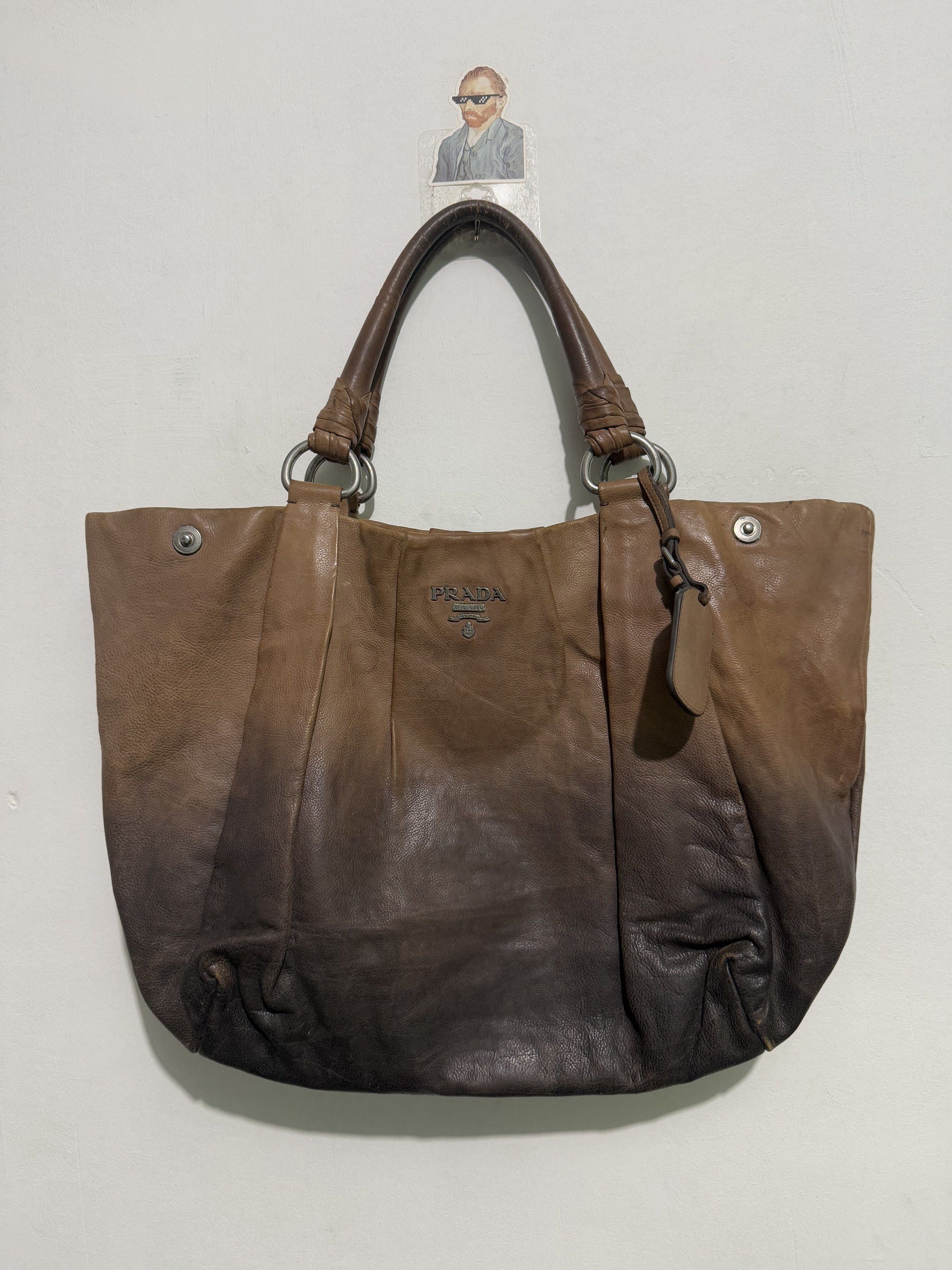 Prada Leather Tote Bag (Category: Luxury Bags & Wallets) located in Sorsogon. Submitted by jovert_23alviz (Listing ID 1417110236, Image 1). Description: Verygood condition Pm for other details.