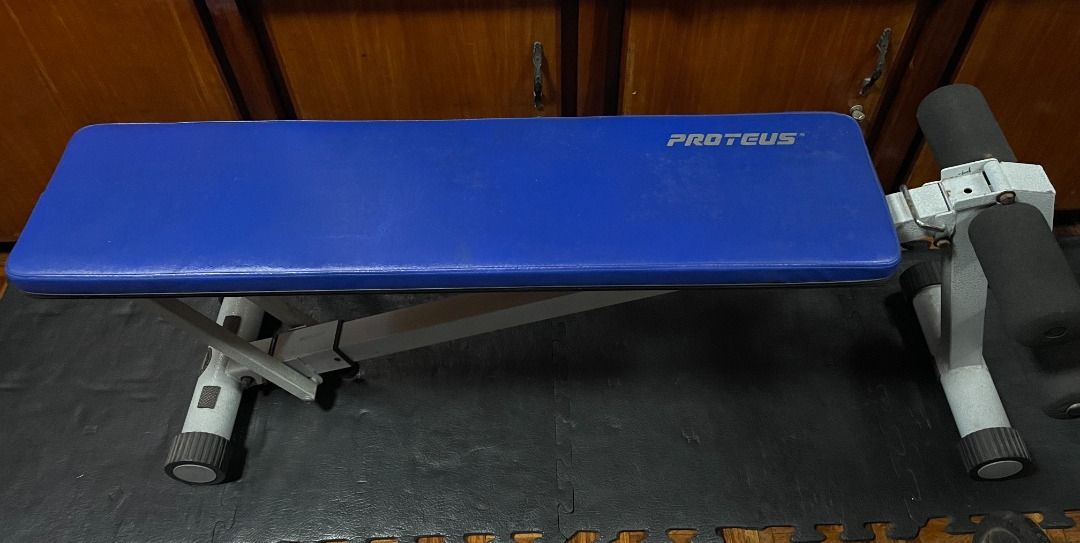 Proteus Adjustable Weight Bench (Category: Weights & Dumbbells) located in Mandaluyong City. Submitted by Rich140 (Listing ID 1417103807, Image 2). Description: - Heavy-duty adjustable weight bench - Adjustable leg support - Foldable for easy storage - Ideal for various exercises in a home gym - Constructed of heavy gauge 3 inches tubing - Incline angle adjustment with easy-to-use pop pin - Easy foldable design for space saving storage - Large di