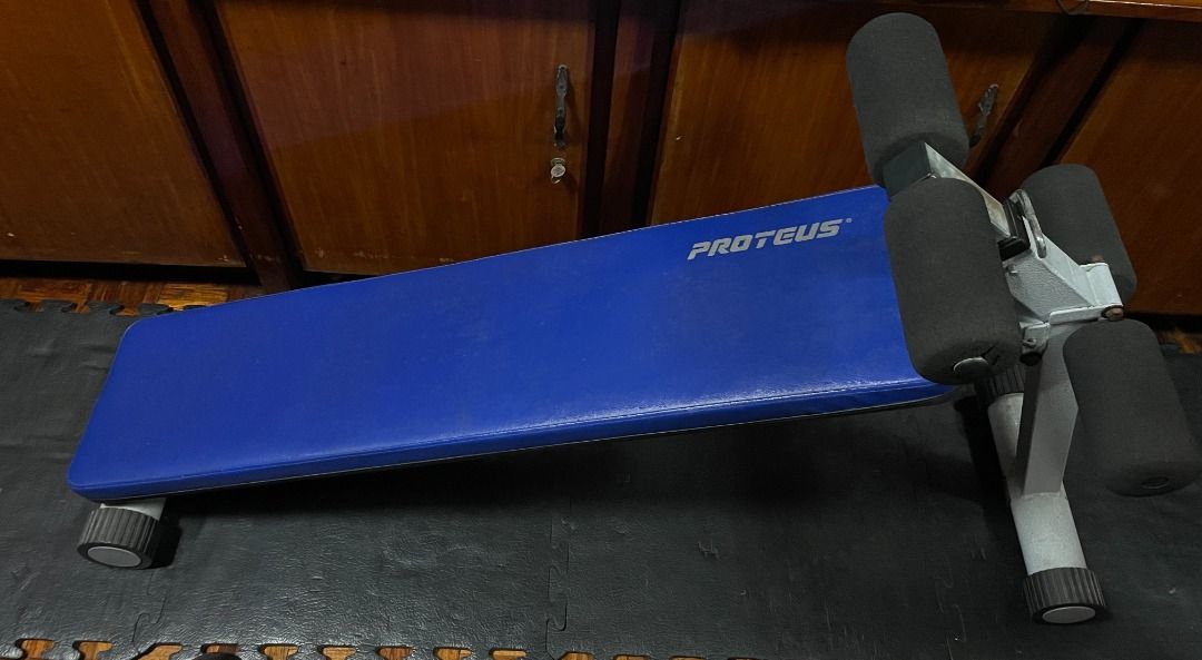 Proteus Adjustable Weight Bench (Category: Weights & Dumbbells) located in Mandaluyong City. Submitted by Rich140 (Listing ID 1417103807, Image 3). Description: - Heavy-duty adjustable weight bench - Adjustable leg support - Foldable for easy storage - Ideal for various exercises in a home gym - Constructed of heavy gauge 3 inches tubing - Incline angle adjustment with easy-to-use pop pin - Easy foldable design for space saving storage - Large di