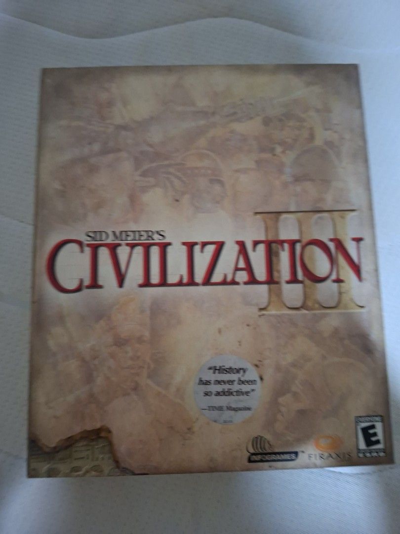 Sid Meier's Civilization III PC Game (Category: Others) located in Marikina City. Submitted by yoh6781 (Listing ID 1417174591, Image 1). Description: - Civilization III PC game - Rated E - Features the quote: "History has never been so addictive." - Box color scheme: Brown and beige - Title color: Red - Published by Infogrames.