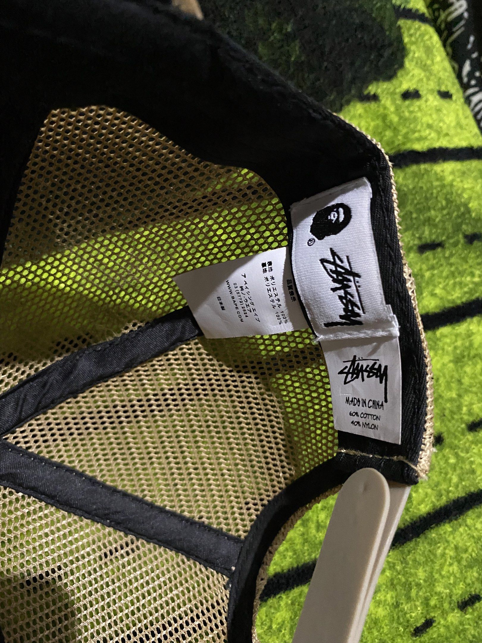 Stussy x BAPE Camo Trucker Cap (Category: Caps & Hats) located in Manila. Submitted by dropndrip (Listing ID 1417205691, Image 3). Description: - Stussy x BAPE Collaboration Cap - Embroidered Stussy logo - Snapback closure for adjustable fit BrandNew / Negotiable.