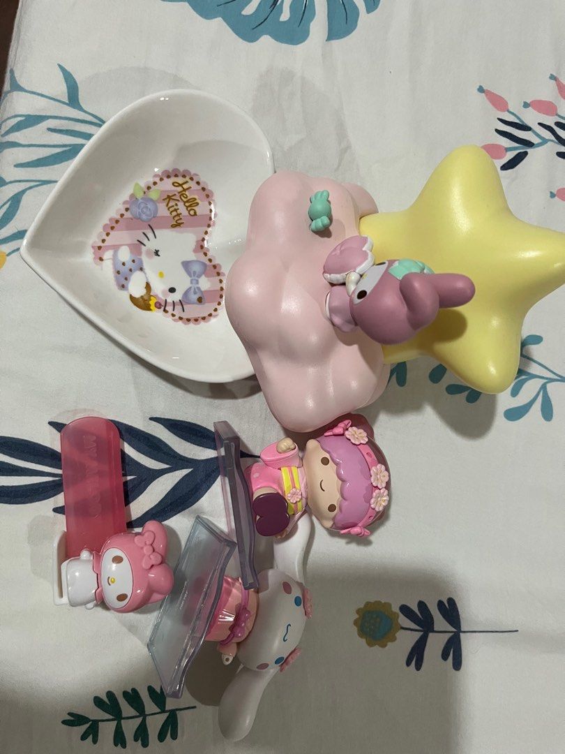 TAKE ALL Hello Kitty and Sanrio Figurines Set (Category: Vintage Collectibles) located in Angeles City. Submitted by luvmazzystar (Listing ID 1417157636, Image 1). Description: - Kitty & Sanrio figurine set - Includes a heart-shaped Kitty dish - Features a star-shaped accessory - Includes various figurines - My Melody figurine with toothbrush holder - Little Twin Stars figurine - Perfect for collectors or decoration.
