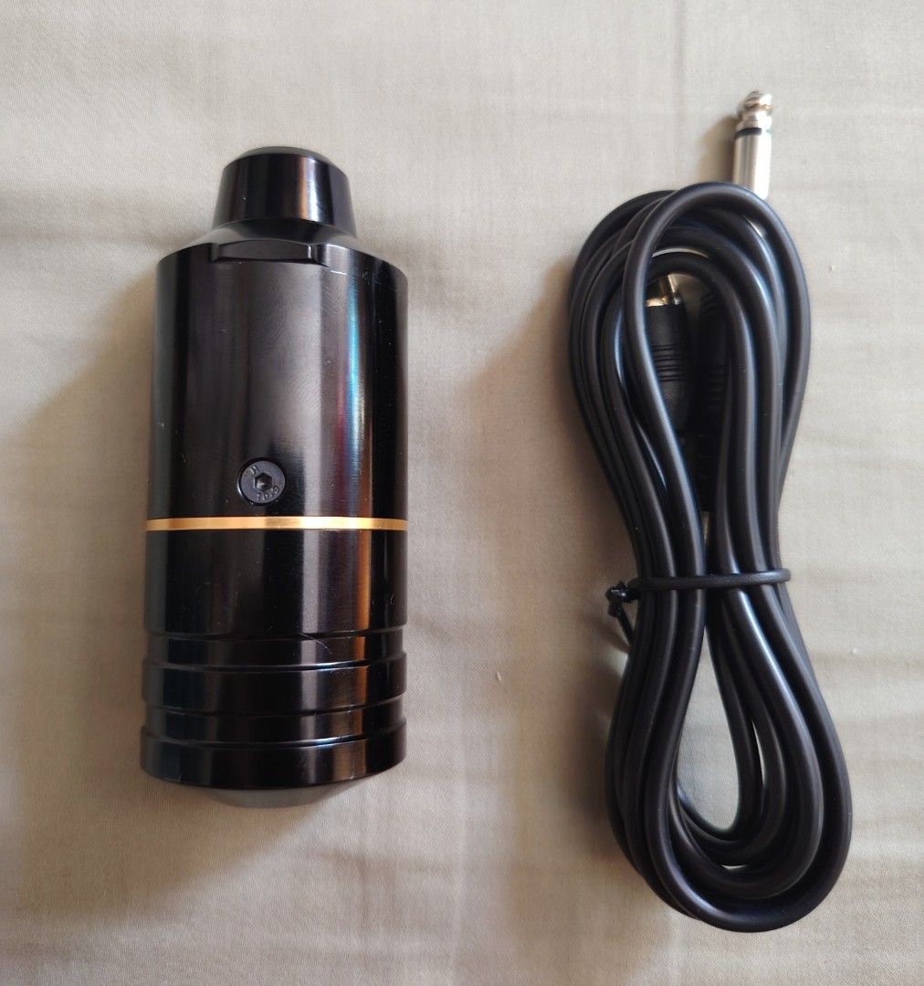 Tattoo Rotary Machine with Cable (Category: Craft Supplies & Tools) located in Manila. Submitted by rollysuela09206 (Listing ID 1417051238, Image 1). Description: - Black rotary tattoo machine - Gold-colored base - Detachable black grip included - Black cable included - Sleek, cylindrical design - Comes with the original box.