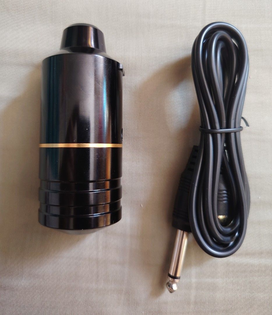 Tattoo Rotary Machine with Cable (Category: Craft Supplies & Tools) located in Manila. Submitted by rollysuela09206 (Listing ID 1417051238, Image 2). Description: - Black rotary tattoo machine - Gold-colored base - Detachable black grip included - Black cable included - Sleek, cylindrical design - Comes with the original box.