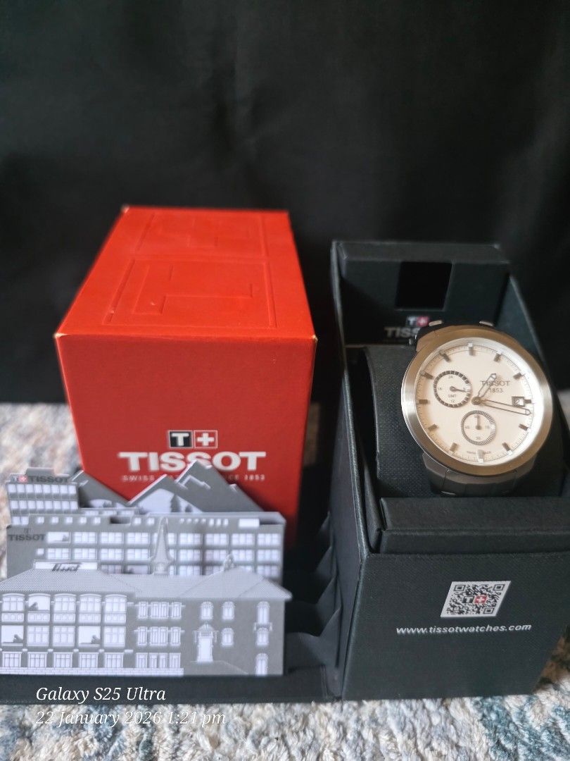 Tissot Titanium GMT White Dial Men's Watch (Category: Luxury Watches) located in Imus. Submitted by my8th (Listing ID 1417078092, Image 3). Description: - Tissot Titanium Watch - Titanium case and bracelet - White dial with skeleton hands - GMT function (24-hour sub-dial) - 43mm case diameter - Water-resistant to 100 meters.