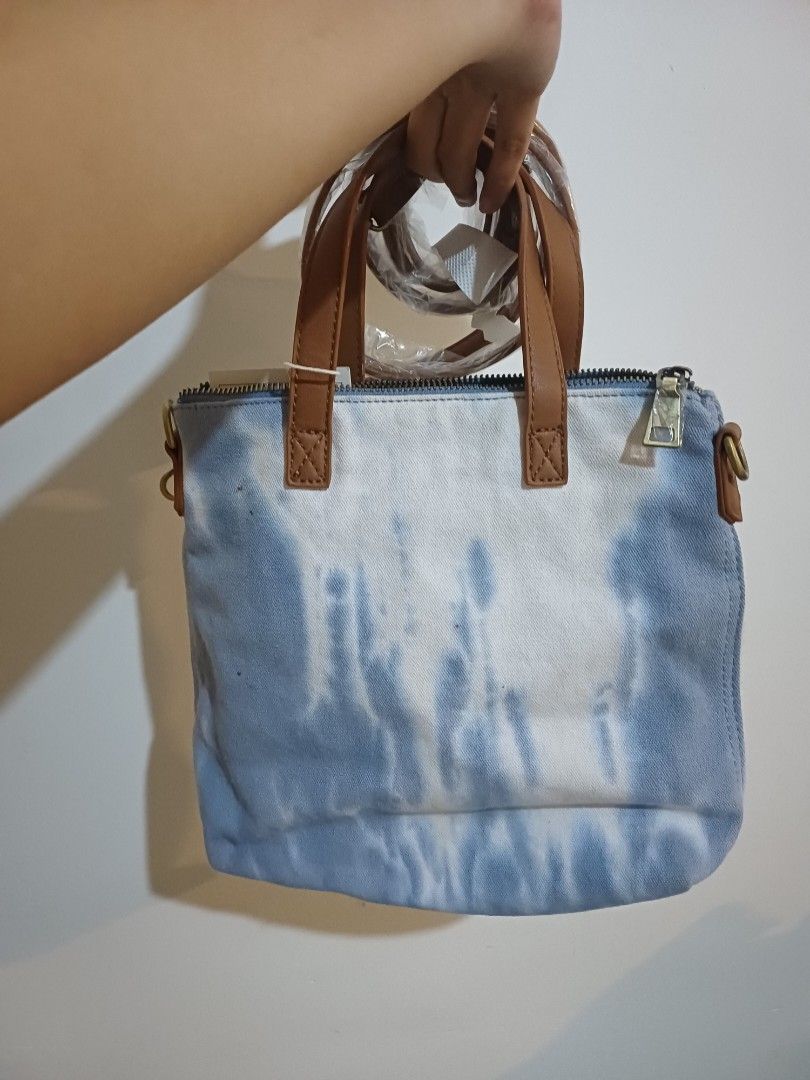 Urban Expressions Hazel Tote Bag (Category: Tote Bags) located in Gumaca. Submitted by m4ruh (Listing ID 1417182176, Image 2). Description: - Urban Expressions Hazel Tote Bag - Stylish tie-dye design - Brown leather handles - Detachable shoulder strap - Secure zipper closure - Spacious interior - Ideal for everyday use.