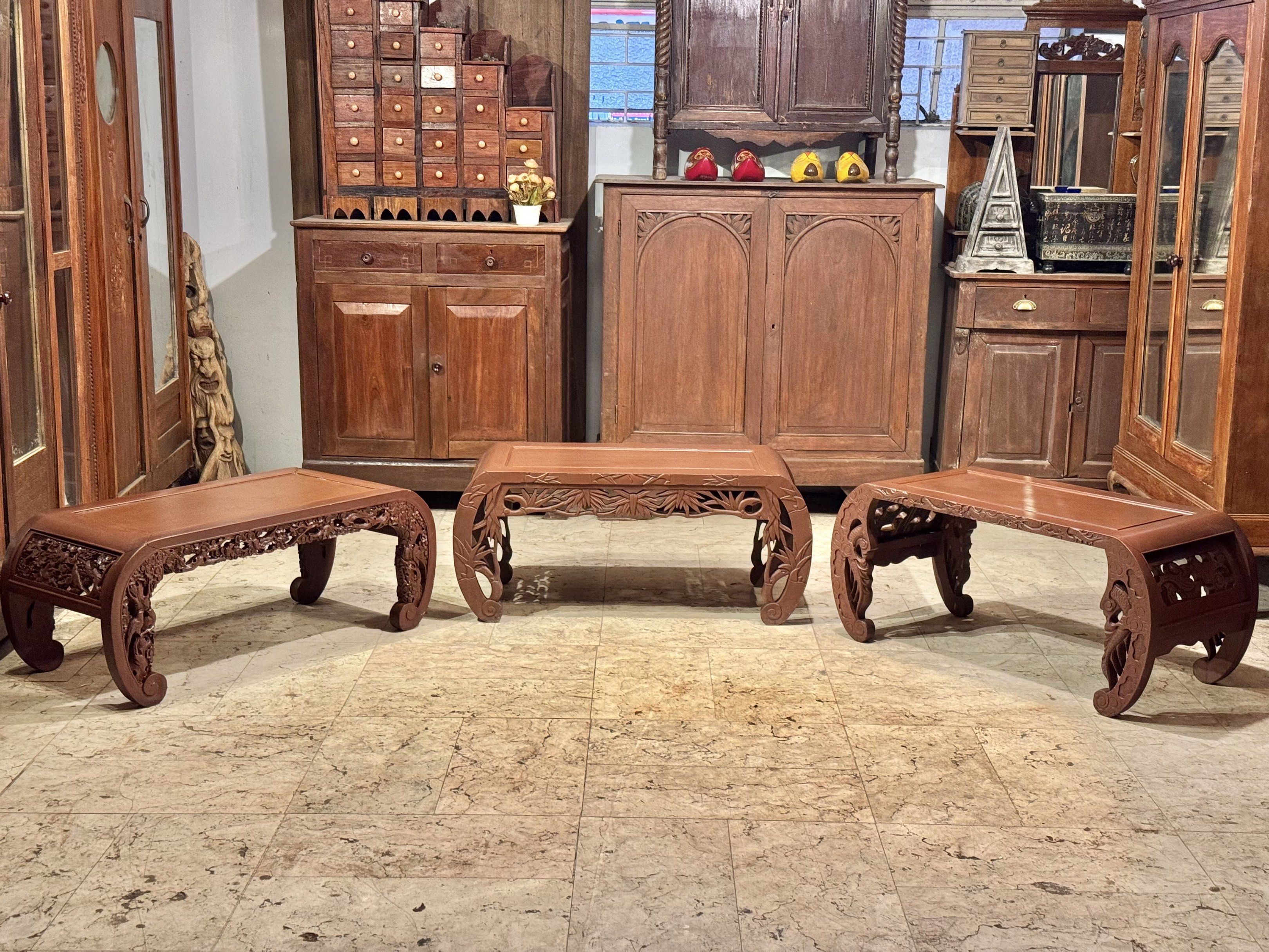 Vintage Narra Kang Tea Table (Category: Tables & Sets) located in Manila. Submitted by sinaunang_gamit (Listing ID 1417144065, Image 1). Description: Vintage Narra Kang Tea Table The tables feature intricate, hand-carved open-work designs, often depicting floral or leaf motifs. They are characterized by their low height and elegantly curved legs, known as “chow legs”. Length: 39 inches Height: 17.5 inches Width: 18 inches ₱8k each or 22k take all