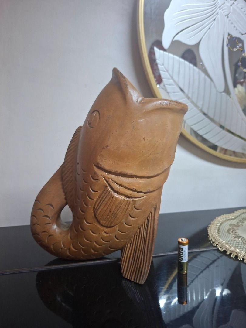 Wooden Fish Utensil Holder (Category: Other Kitchenware & Tableware) located in Taguig. Submitted by d_man11 (Listing ID 1417166105, Image 3). Description: - Solid one piece wood - Hand carved piece - Open mouth design for easy tool storage - Can be used as a decorative piece - Great for kitchen or dining area Dimensions 30 cm tall x 19 cm x 13 cm .