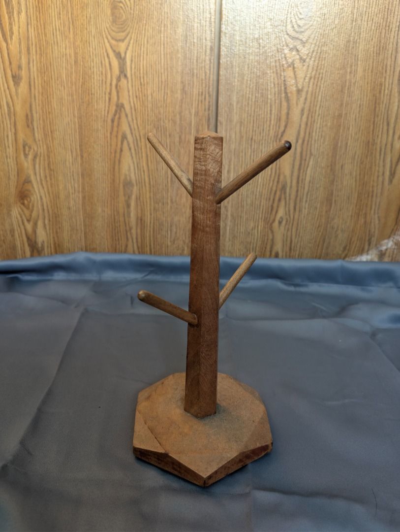 Wooden Mug Tree Holder (Category: Other Home Decor) located in Quezon City. Submitted by trainforless (Listing ID 1417139272, Image 2). Description: - Holds multiple mugs - Sturdy base - Natural wood finish - Adds a rustic touch - Perfect for kitchen or dining area.