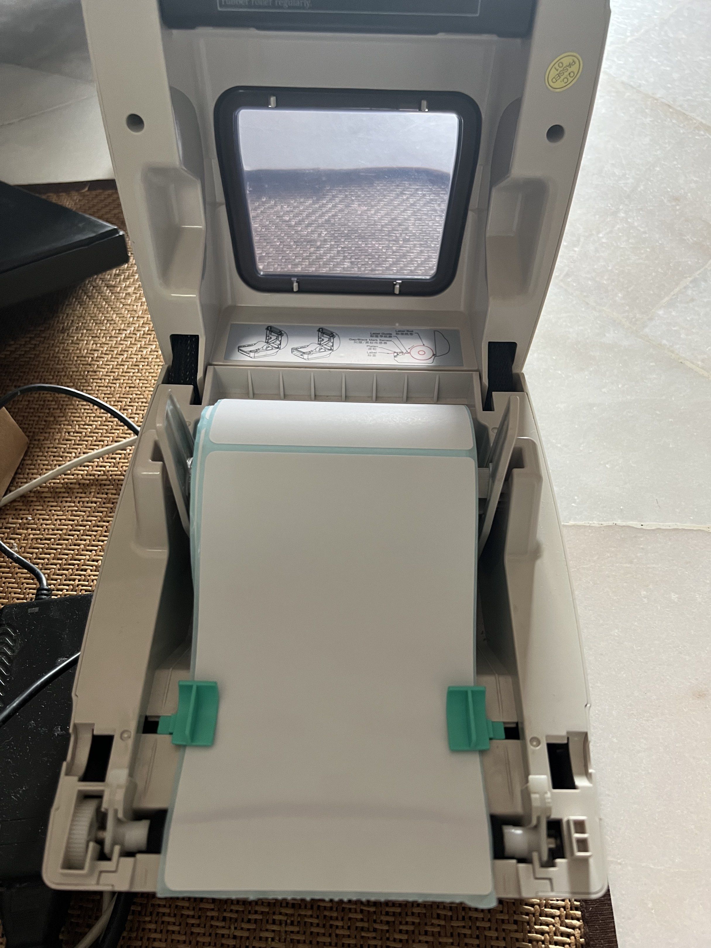 Xprinter Label Printer (Category: Printers, Scanners & Copiers) located in Kuala Lumpur. Submitted by miza273 (Listing ID 1417047538, Image 3). Description: - Xprinter label printer - Includes power adapter (UK plug) - Comes with a roll of label paper (FREE) - Features a green button and clear window NO BOX Bluetooth and USB Self collect only USJ Subang Jaya.