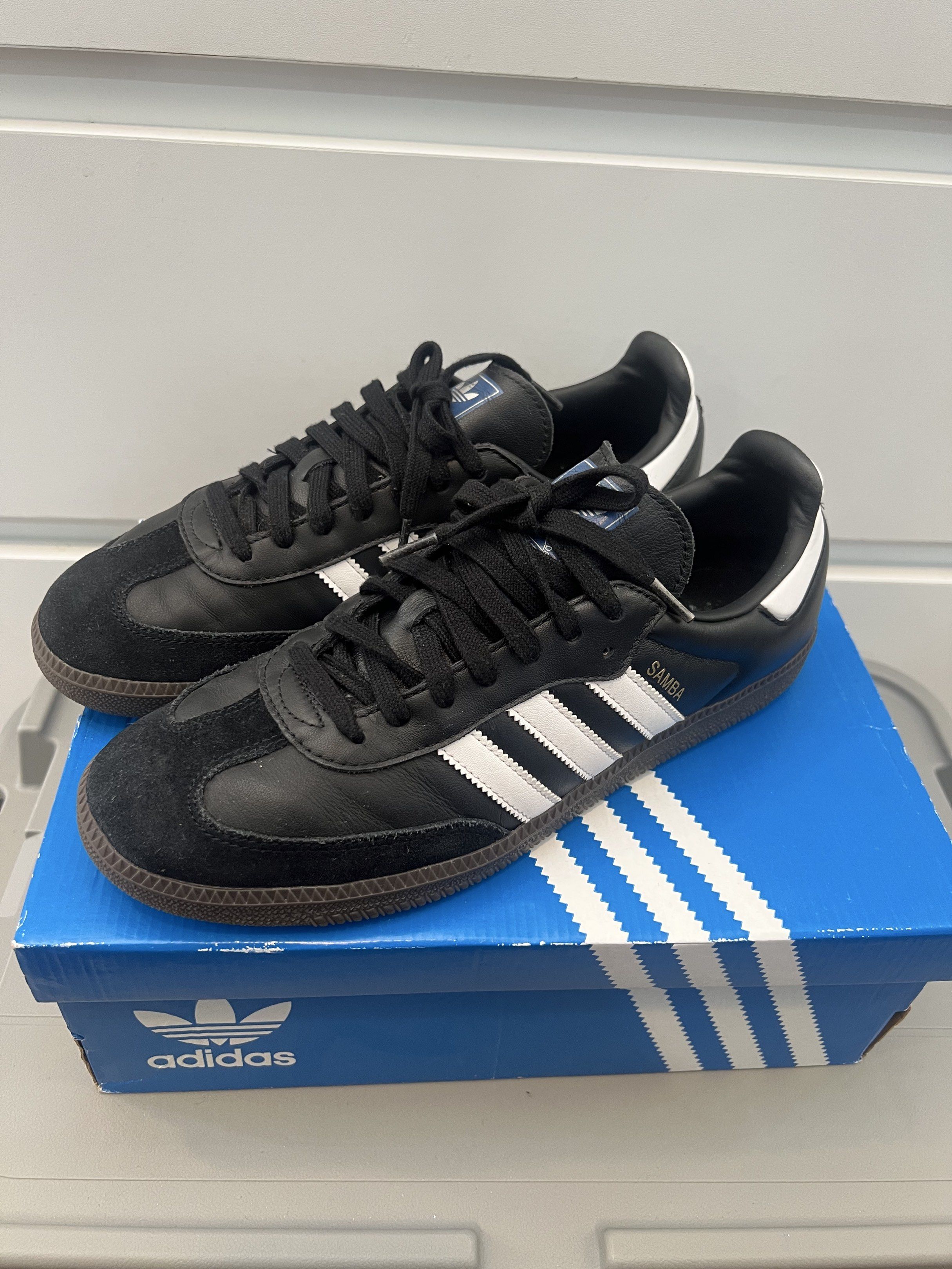 Adidas Samba OG Black White Gum (Category: Sneakers) located in Quezon City. Submitted by authenticcloset (Listing ID 1417320858, Image 1). Description: Adidas Samba OG sneakers in black and white. Features the iconic three stripes and a gum sole. The shoes are size US 11. Comes with the original box. Made in Vietnam. The shoes have black laces and the Adidas logo on the tongue. Used a few times only pls check photos for the condition.