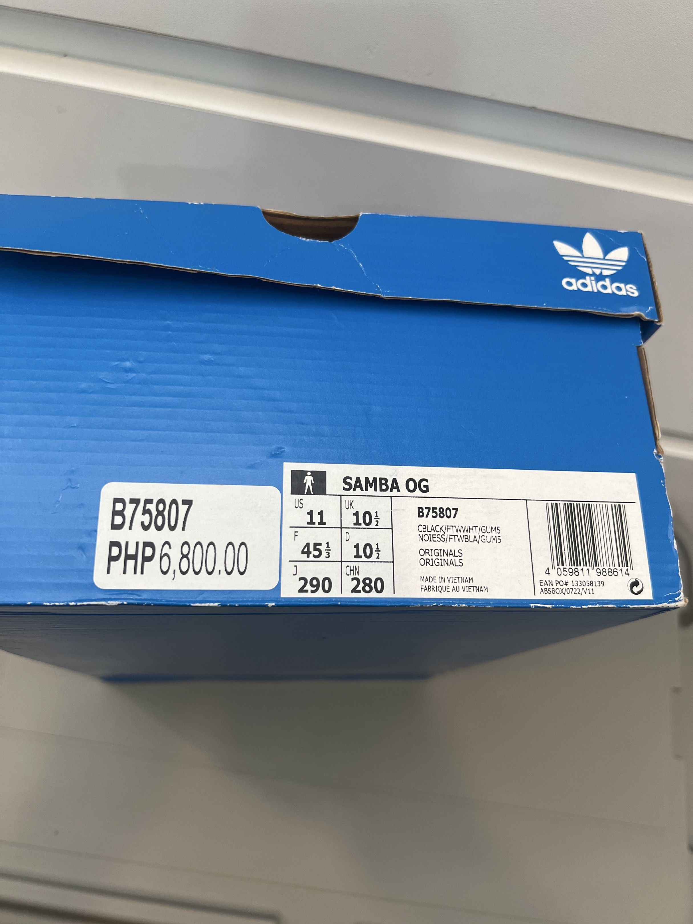 Adidas Samba OG Black White Gum (Category: Sneakers) located in Quezon City. Submitted by authenticcloset (Listing ID 1417320858, Image 3). Description: Adidas Samba OG sneakers in black and white. Features the iconic three stripes and a gum sole. The shoes are size US 11. Comes with the original box. Made in Vietnam. The shoes have black laces and the Adidas logo on the tongue. Used a few times only pls check photos for the condition.