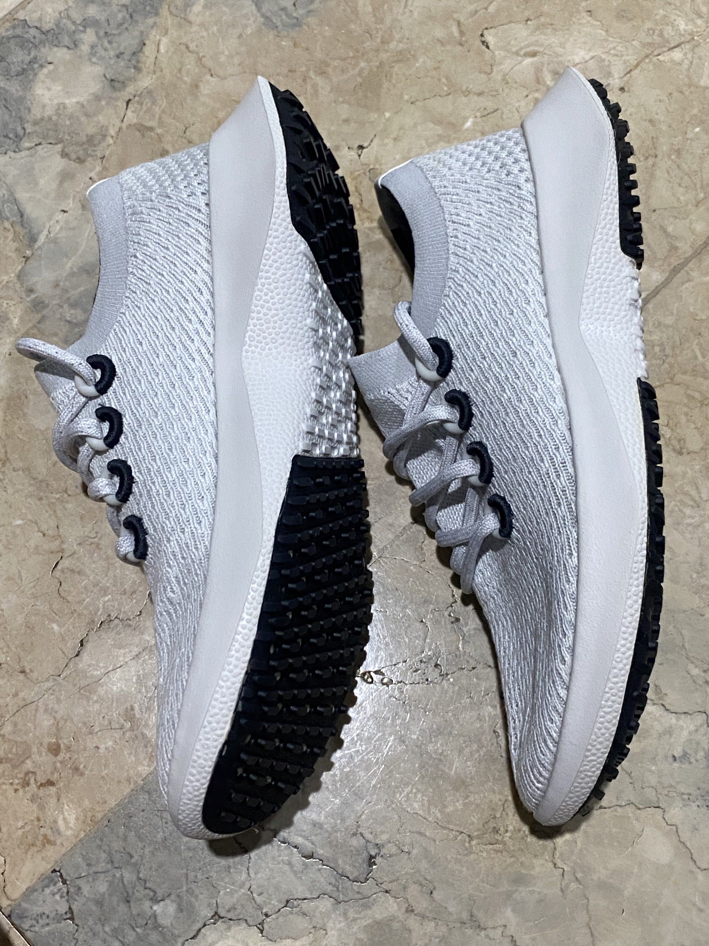 Allbirds Women's Tree Dasher 2 (Category: Sneakers) located in Pasig City. Submitted by neka2017 (Listing ID 1417280309, Image 2). Description: - Allbirds Women's Tree Dasher 2 sneakers - Color: Light Grey - Sole: White - Eyelets: Dark Blue - Size: US 10, UK 7-7.5, EU 40 - Made in Vietnam - Features a breathable knit upper - Cushioned sole for comfort - Allbirds logo on heel.