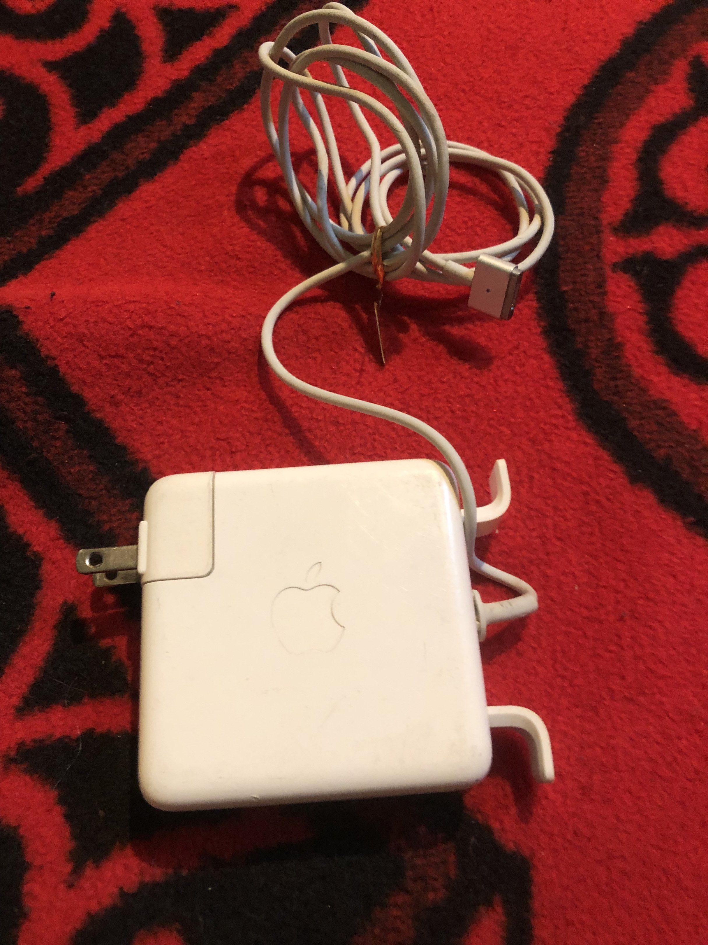 Apple Mag Safe 2 85W adapter brick (Category: Chargers) located in Quezon City. Submitted by markgolveo (Listing ID 1417259217, Image 1). Description: Apple Mag Safe 2 85W adapter brick Rubber protector medyo umangat but it can be glued back in.