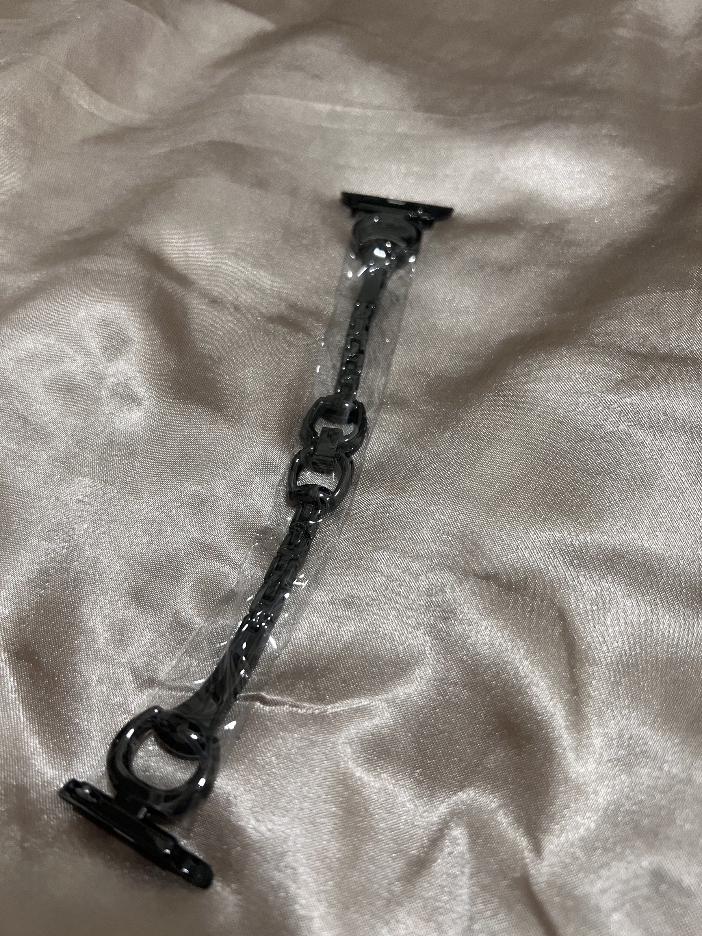 Apple Watch Strap 38mm/40mm/41mm Black (Category: Women's Watches) located in Mandaluyong City. Submitted by mnlmeetup (Listing ID 1417335372, Image 3). Description: - Black watch strap for Apple Watch - Fits 38mm, 40mm, and 41mm models - Stylish chain link design - Brand new, still in original packaging - Made in China.