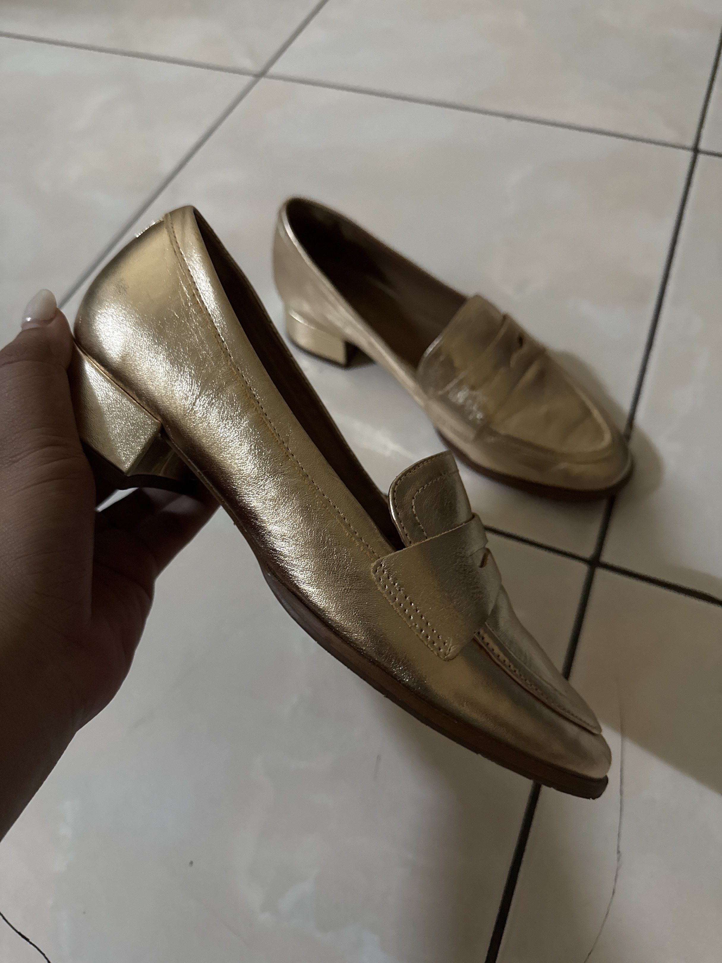 Arezzo Gold Loafers (Category: Loafers) located in Manila. Submitted by aesbl (Listing ID 1417363056, Image 1). Description: - Arezzo gold penny loafers - Classic design - Low block heel - Metallic gold finish - Leather material - Arezzo logo on insole.