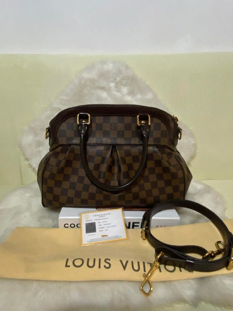 Authentic LV Damier Ebene Trevi PM size (Category: Luxury Bags & Wallets) located in Marikina City. Submitted by aussiemaan (Listing ID 1409271147, Image 1). Description: Authentic Preloved Rank A condition With Entrupy cert and orig sling.