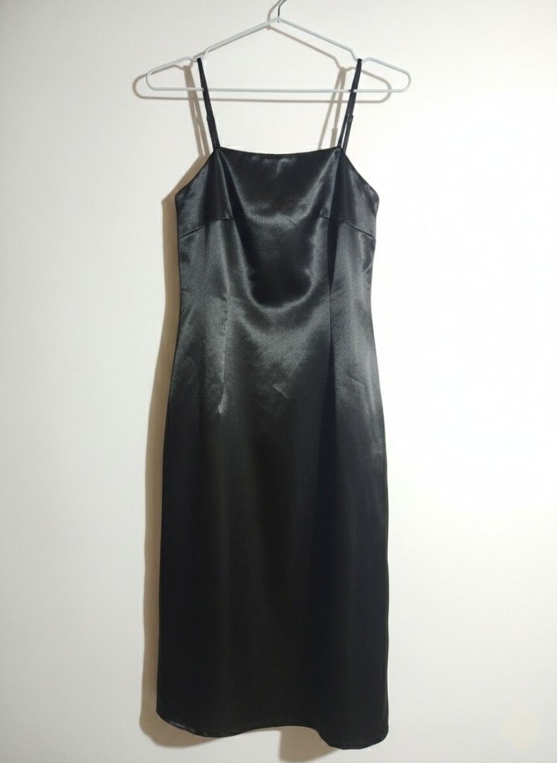 Black Satin Slip Dress (Category: Dresses) located in Tuguegarao City. Submitted by stylecart_ph (Listing ID 1417402940, Image 1). Description: - Black satin slip dress - Midi length - Thin spaghetti straps - Classic design - Perfect for formal events or a night out - Ready to wear.