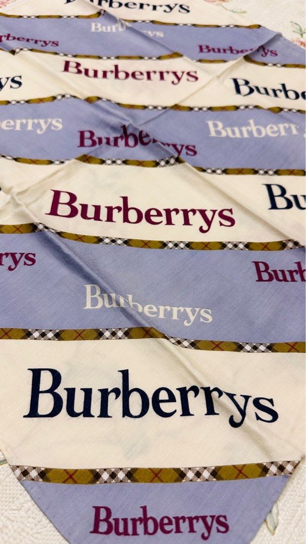 BURBERRY Classic Handkerchief (Category: Luxury Accessories) located in Manila. Submitted by rarefindsgallery (Listing ID 1417296477, Image 3). Description: Burberry Classic Handkerchief Size: 19.5”” x 19” Material: 💯 cotton Hand rolled hem Authentic Made in Japan 🇯🇵 This is a vintage Burberrys handkerchief/bandana featuring the iconic check pattern with repeated BURBERRYS text..