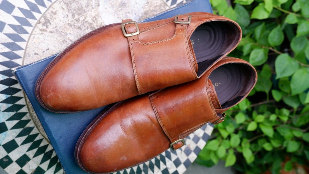 Cole Haan Harrison Grand Loafers (Category: Dress Shoes) located in Cebu City. Submitted by ohkmllr (Listing ID 1417360845, Image 2). Description: - Cole Haan Harrison Grand Double Monk shoes - Color: British Tan - Size: 8.5M - Closure: Double monk strap - Condition: Shows wear on soles - Includes original box - Features Cole Haan logo on insole.