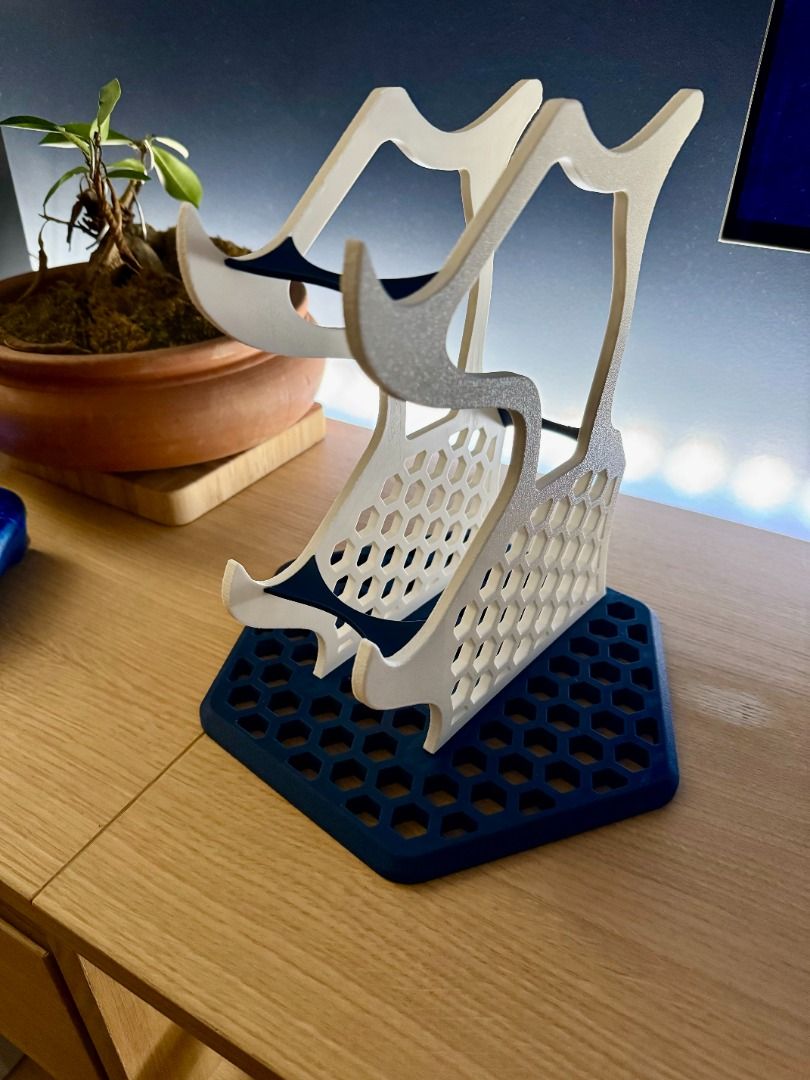 Controller / Headset Holder | Controller Stand PS5 (Category: Controllers) located in Mandaluyong City. Submitted by heyitslaaaance (Listing ID 1417220256, Image 2). Description: Organize your gaming setup in style with this Controller & Headset Holder, designed to hold two controllers + one headset securely. Featuring a modern honeycomb design and a sturdy dual‑tier frame, this stand keeps your gear easily accessible while adding a premium touch