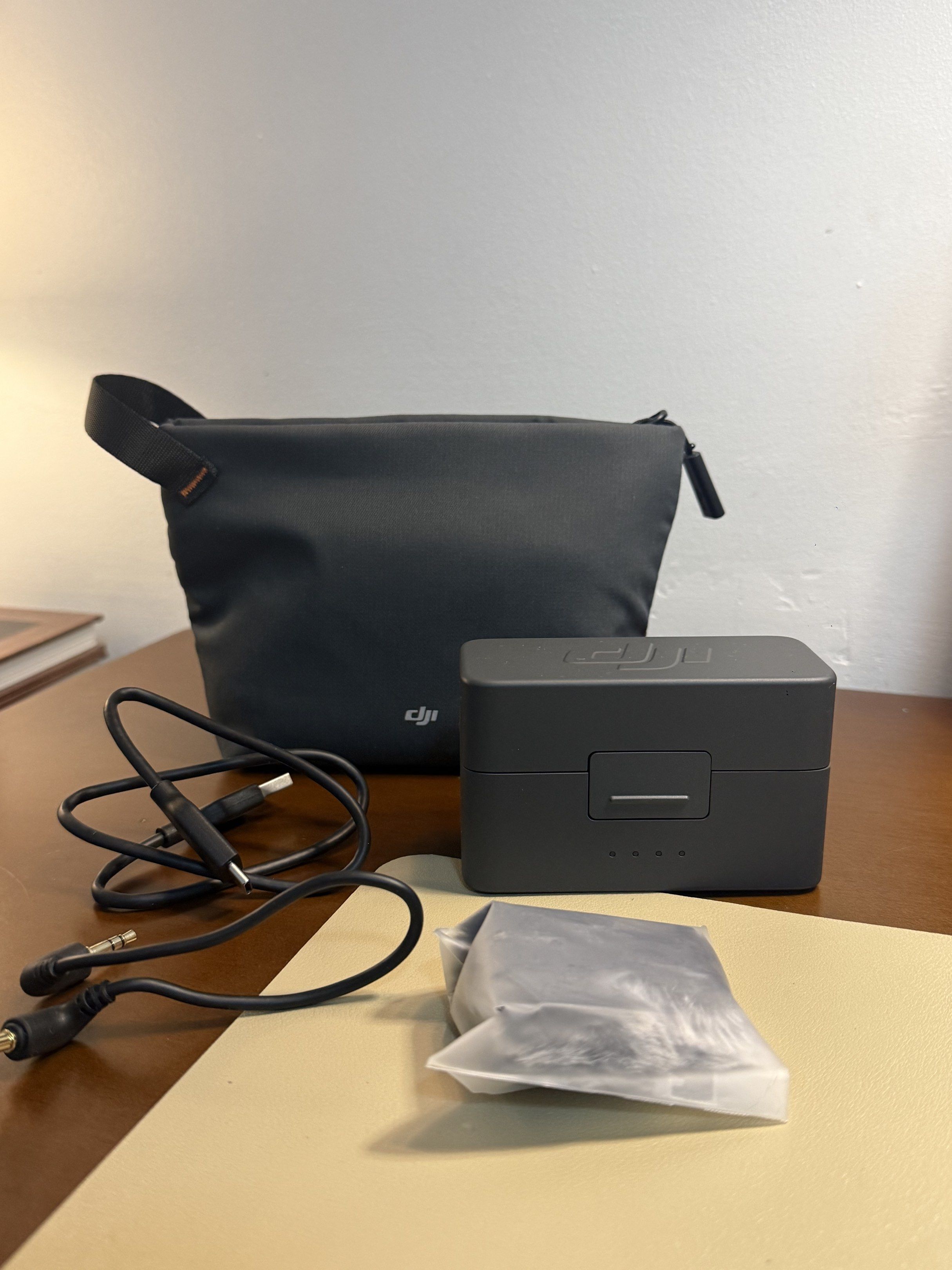 DJI Mic Mini Wireless Microphone (Category: Microphones) located in Manila. Submitted by ryansellsstuff (Listing ID 1417298961, Image 2). Description: - DJI Mic Mini wireless microphone set - Includes charging case - Two microphones included - Comes with a carrying bag - Various cables included - Ready for audio recording - All items in the photo are included - Used 3-4 times - RFS: additional funds - Price: 6500.