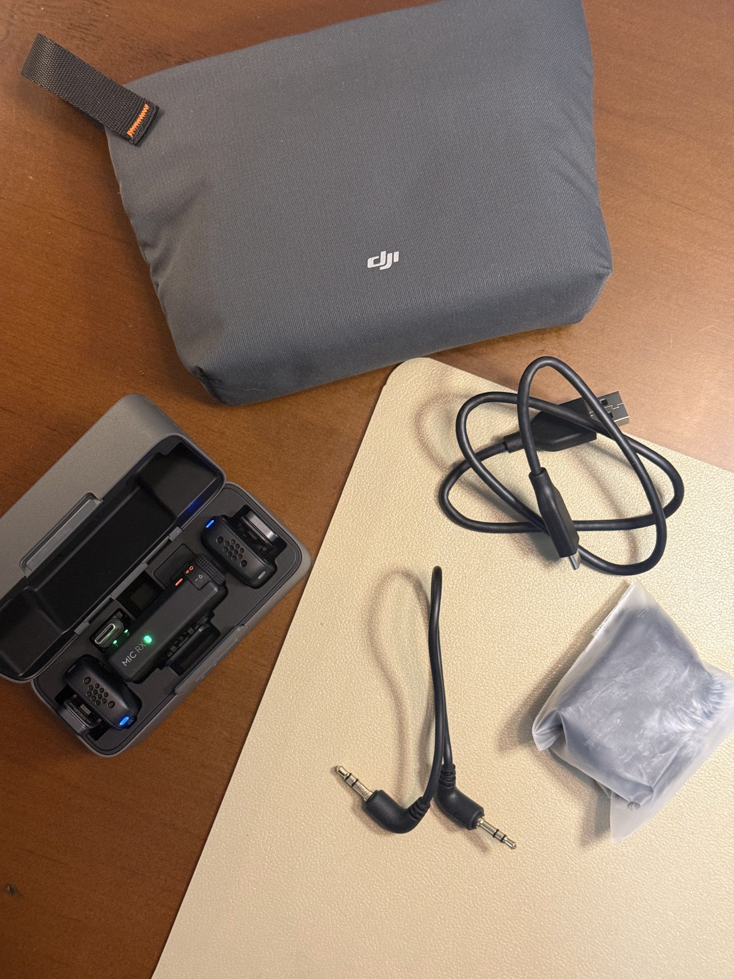 DJI Mic Mini Wireless Microphone (Category: Microphones) located in Manila. Submitted by ryansellsstuff (Listing ID 1417298961, Image 3). Description: - DJI Mic Mini wireless microphone set - Includes charging case - Two microphones included - Comes with a carrying bag - Various cables included - Ready for audio recording - All items in the photo are included - Used 3-4 times - RFS: additional funds - Price: 6500.