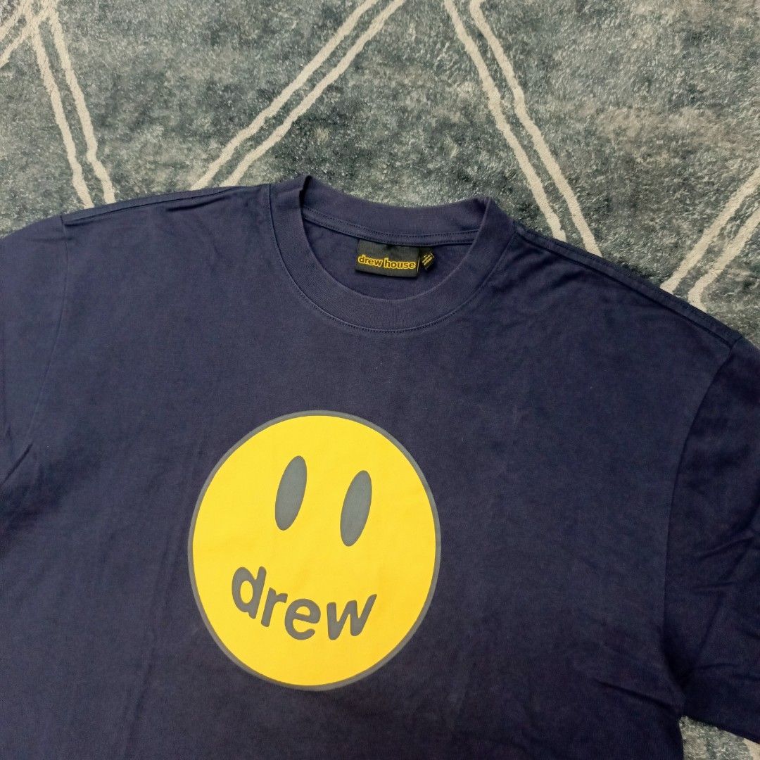 Drew House Smiley Face T-shirt (Category: Tshirts & Polo Shirts ) located in Davao. Submitted by airdrop28 (Listing ID 1417278931, Image 2). Description: NEW ARRIVAL‼️ 📍DREW HOUSE - NAVY BLUE (SOLID NETO🔥) •Excellent condition •Colour: Navy Blue •Colour rate: 10/10 •Size: Large on tag •Width: 22 in •Length: 26 in •No issue •Price: 399❗ 📍Location: SAMAL /BUHANGIN DAVAO CITY.