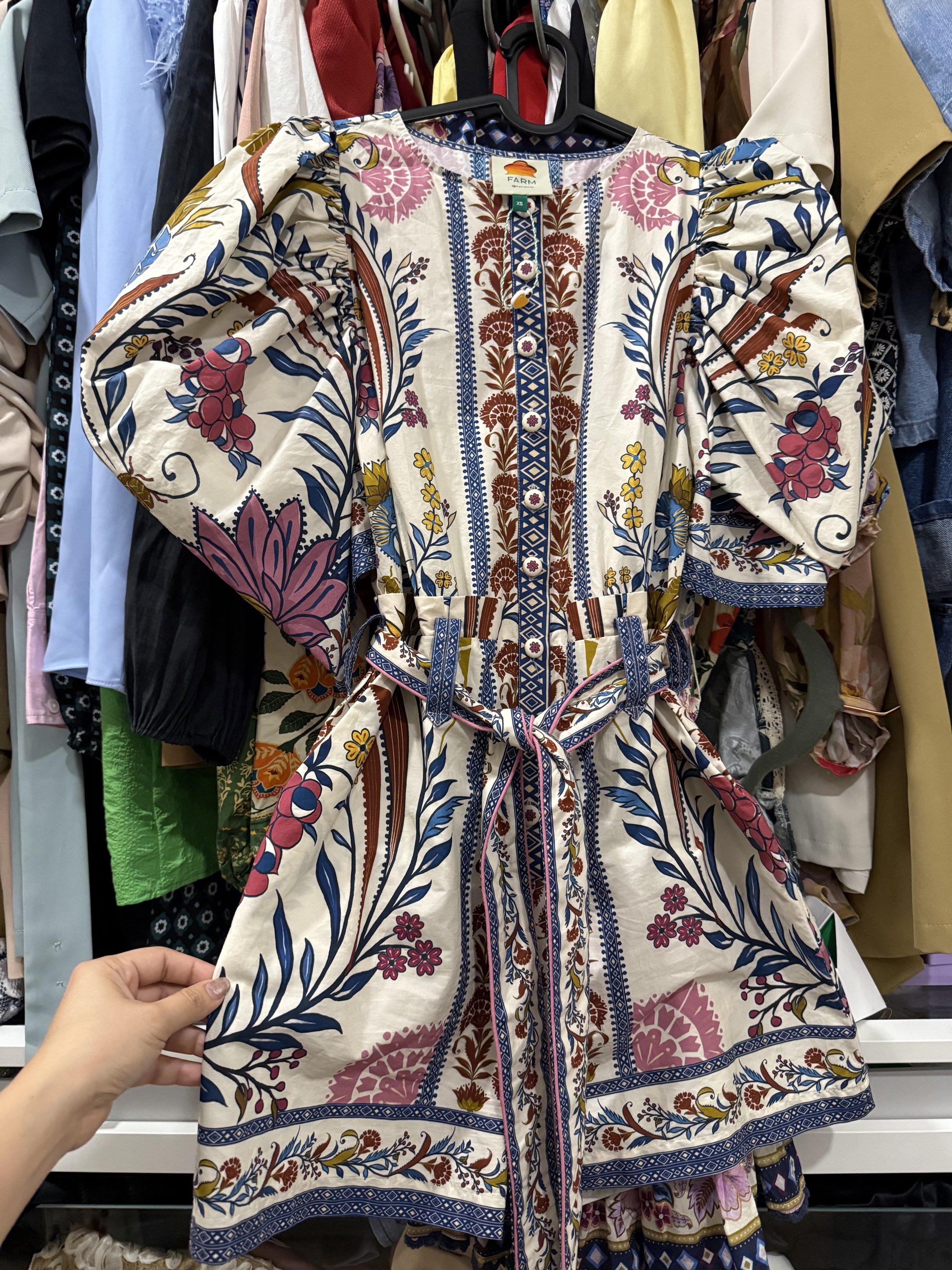 Farm Rio Floral Print Romper (Category: Dresses) located in Paranaque City. Submitted by larabnew (Listing ID 1417260967, Image 3). Description: - Farm Rio dress - Size: XS - Stunning floral print - Puff sleeves - Button-down front - Includes matching belt - Lightweight fabric - Ideal for warm weather - Unique design with intricate details.